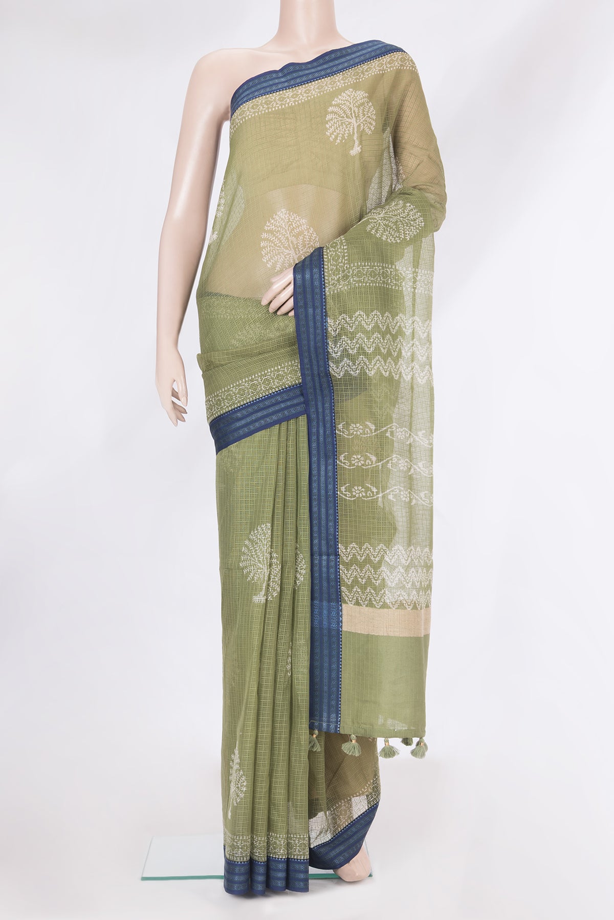 Sage Green Kota Silk Saree with Checked design on the body and Thread Border.  displayed on a mannequin