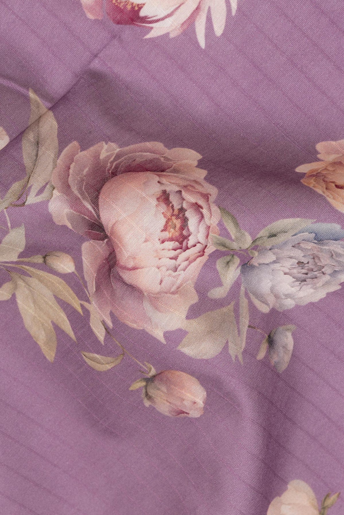 Close up of Pure Silk Purple Dual Tone Chanderi Saree with Printed design on the body and Zari And Thread Border.  displaying folds