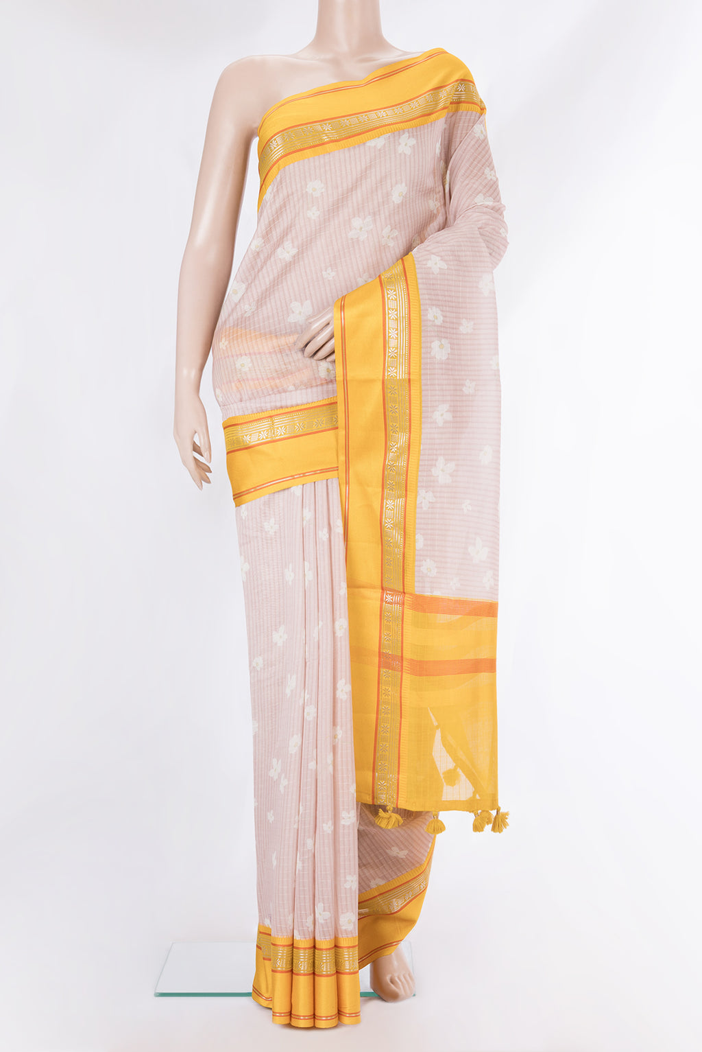 Pure Silk Rose Gold Dual Tone Chanderi Saree with Printed design on the body and Zari And Thread Border.  displayed on a mannequin