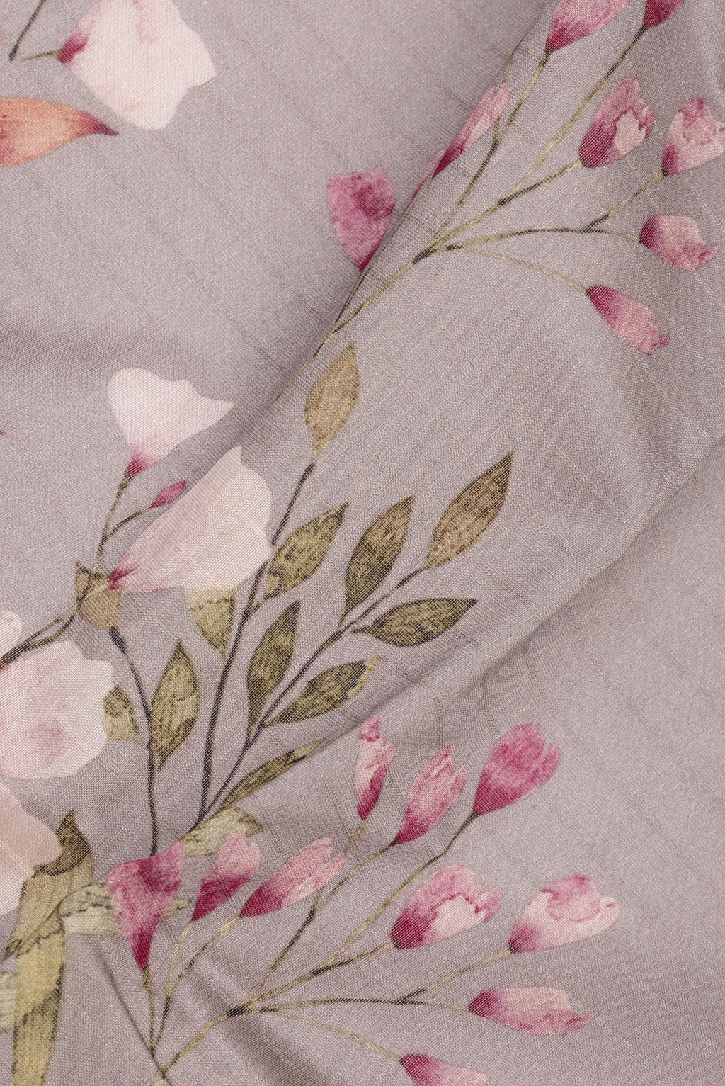 Close up of Pure Silk Grey Dual Tone Chanderi Saree with Printed design on the body and Zari And Thread Border.  displaying folds
