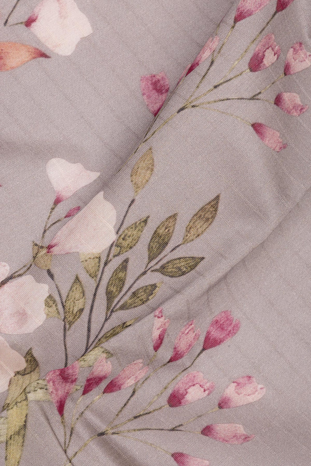 Close up of Pure Silk Grey Dual Tone Chanderi Saree with Printed design on the body and Zari And Thread Border.  displaying folds