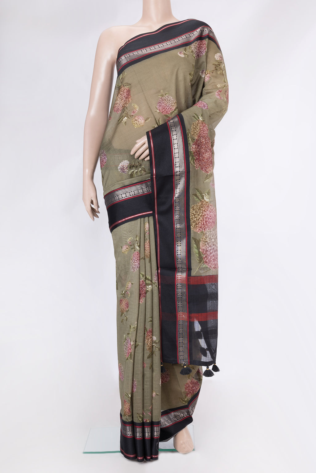 Mehandi Green Dual Tone Chanderi Silk Cotton Saree with Printed design on the body and Zari And Thread Border.  displayed on a mannequin
