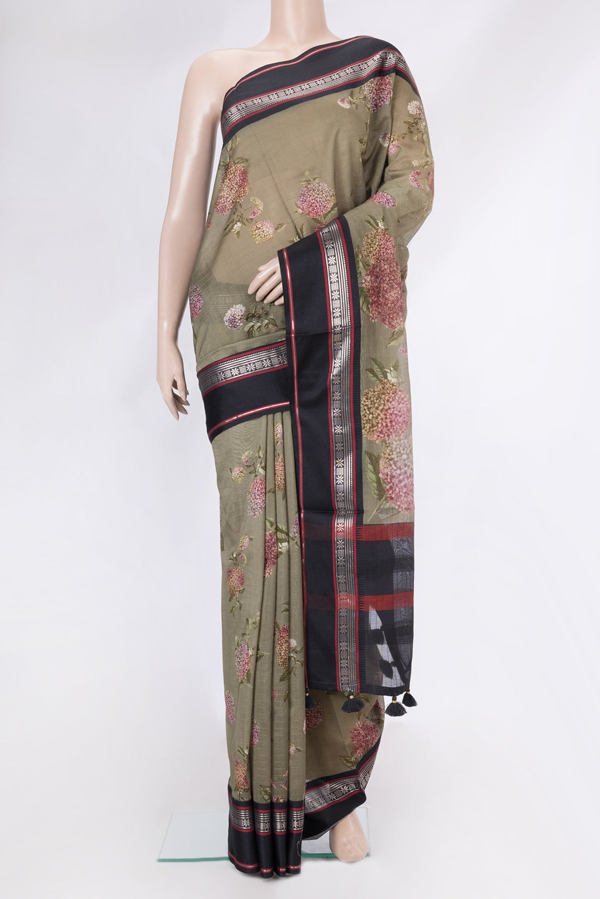 Mehandi Green Dual Tone Chanderi Silk Cotton Saree with Printed design on the body and Zari And Thread Border.  displayed on a mannequin