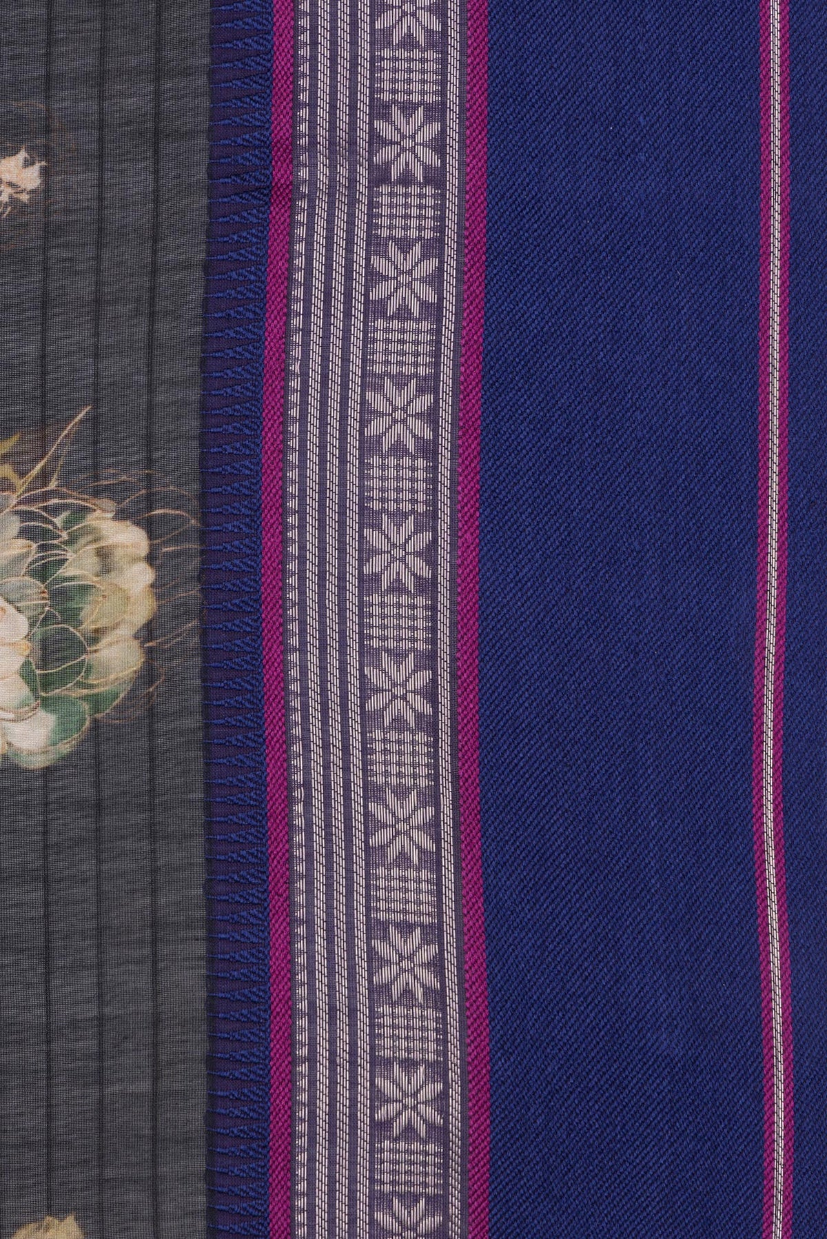 Border image of Pure Silk Black Dual Tone Chanderi Saree with Printed design on the body and Zari And Thread Border. 