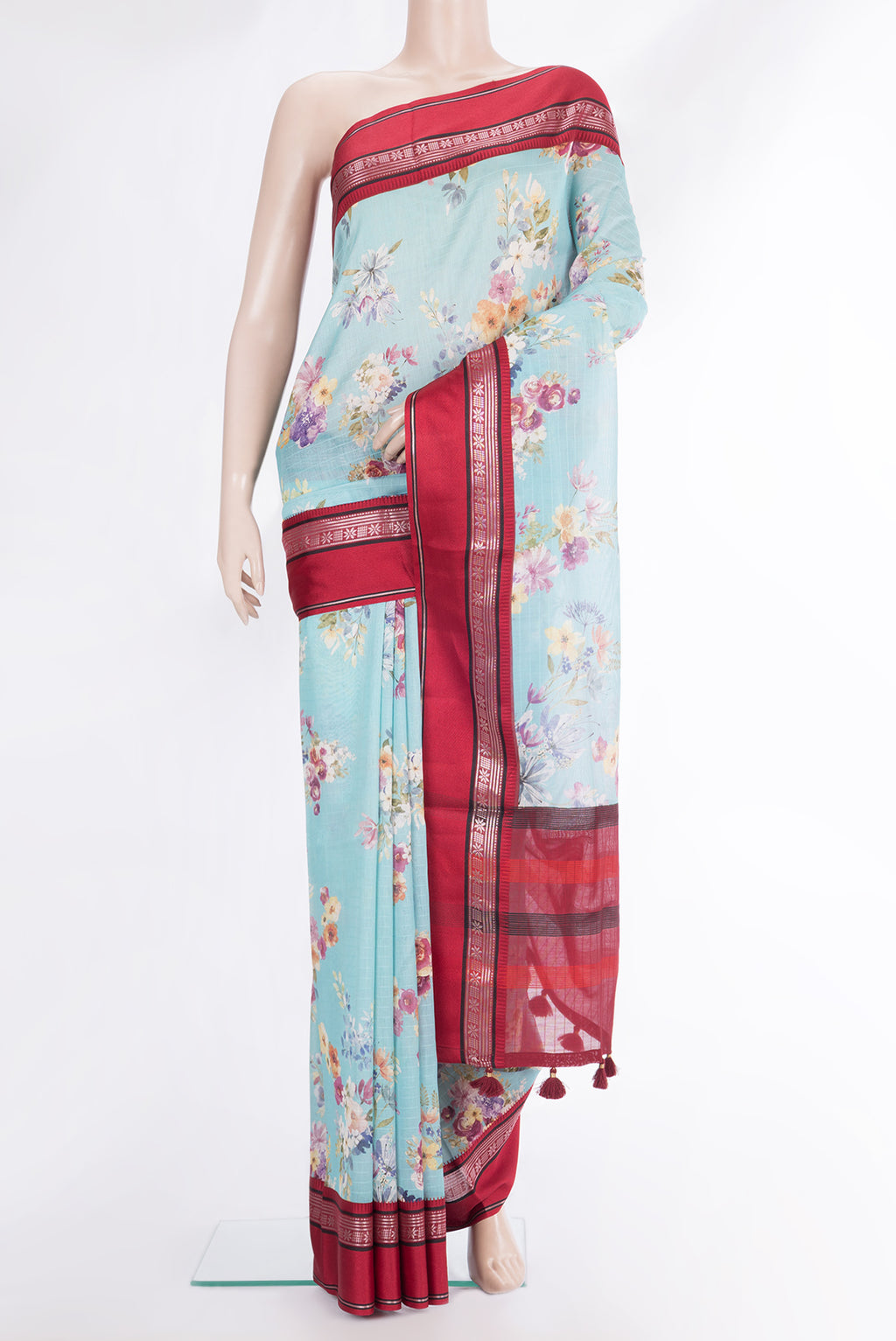 Pure Silk Sky Blue Dual Tone Chanderi Saree with Printed design on the body and Zari And Thread Border.  displayed on a mannequin