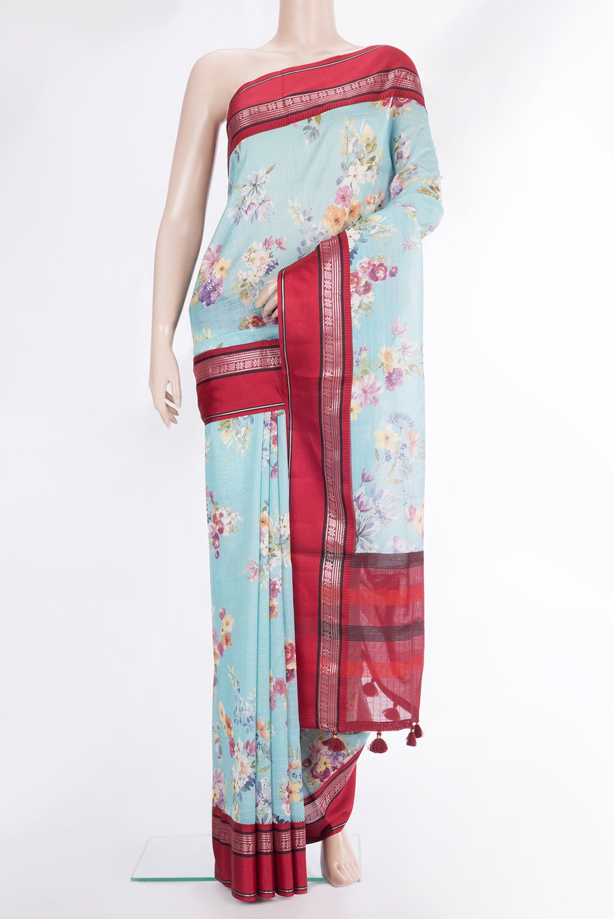 Pure Silk Sky Blue Dual Tone Chanderi Saree with Printed design on the body and Zari And Thread Border.  displayed on a mannequin