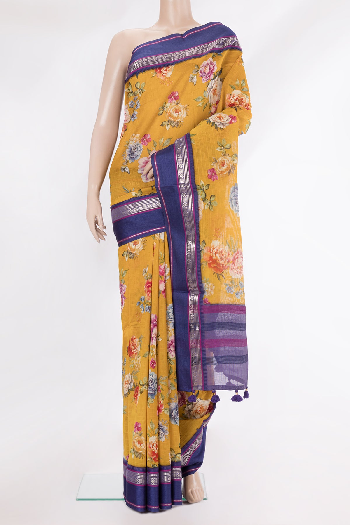 Pure Silk Mustard Dual Tone Chanderi Saree with Printed design on the body and Zari And Thread Border.  displayed on a mannequin