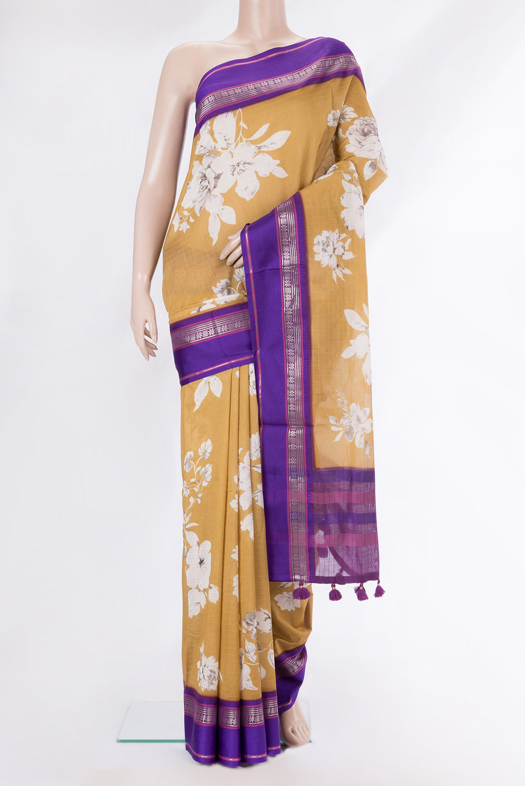 Pure Silk Mustard Dual Tone Chanderi Saree with Printed design on the body and Zari And Thread Border.  displayed on a mannequin