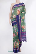 Pure Silk Green Dual Tone Chanderi Saree with Printed design on the body and Zari And Thread Border.  displayed on a mannequin