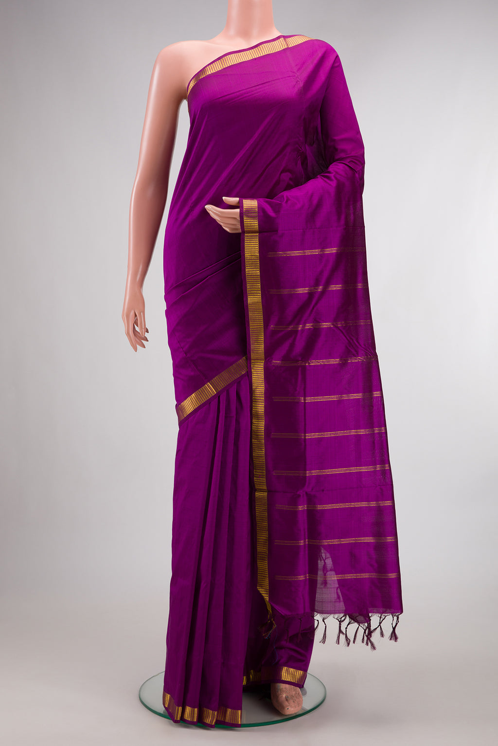 Pure Silk Purple Kanjivaram Nine Yards Saree with Plain Body and Zari Border.  displayed on a mannequin