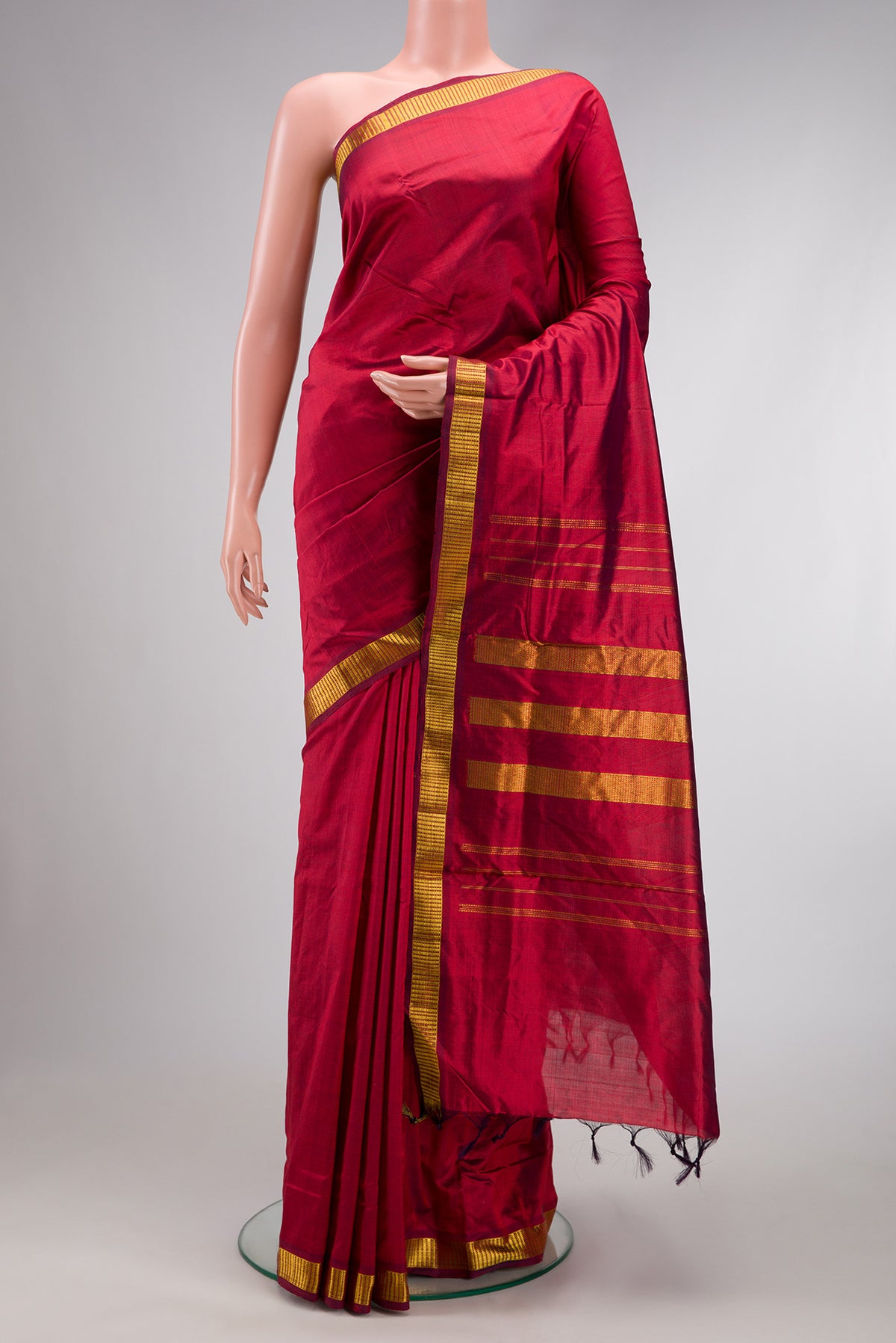 Maroon Dual Tone Kanjivaram Silk Nine Yards Saree with Plain Body and Zari Border.  displayed on a mannequin