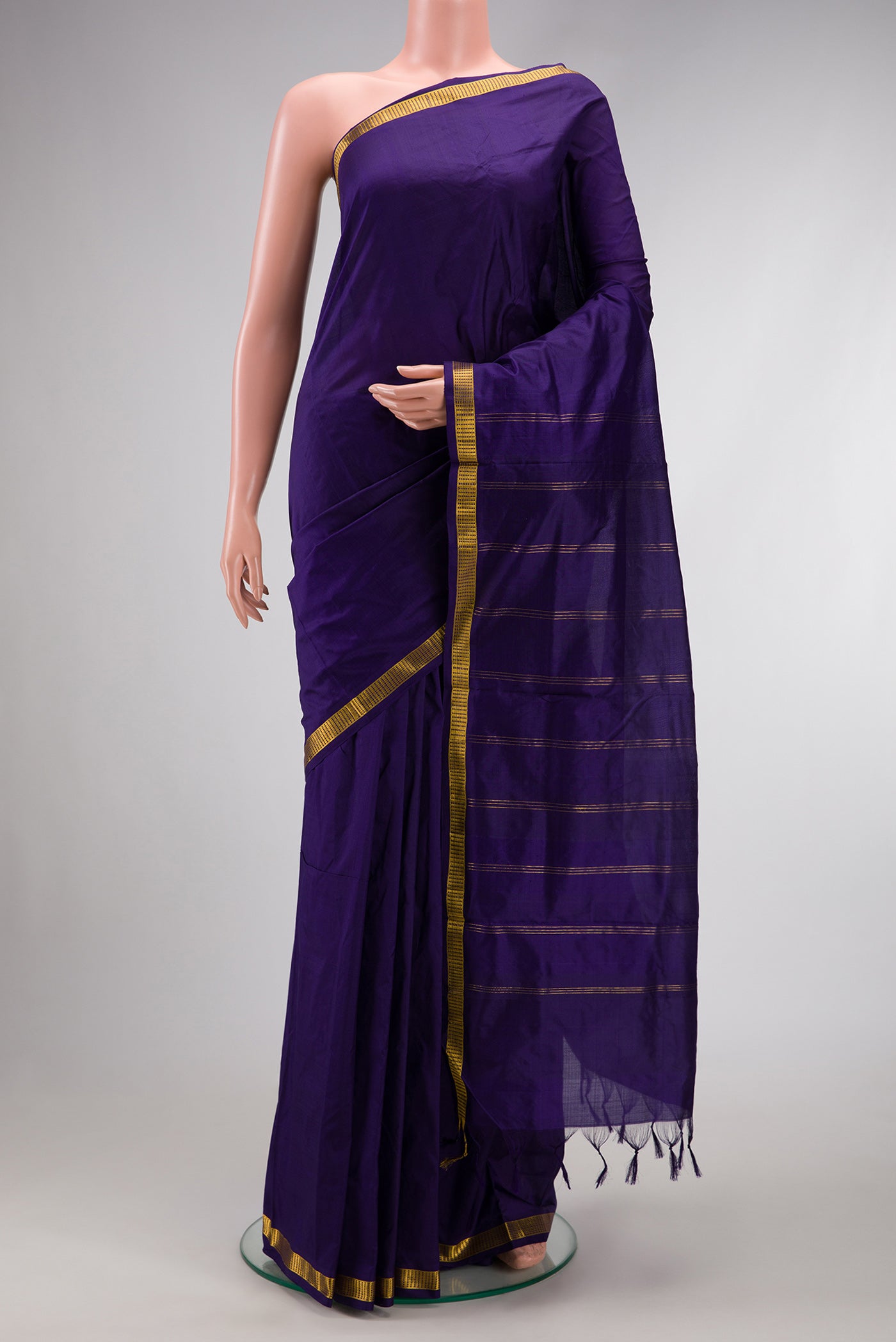 Navy Blue Dual Tone Kanchipuram Silk Nine Yards Saree with Plain Body and Zari Border.  displayed on a mannequin