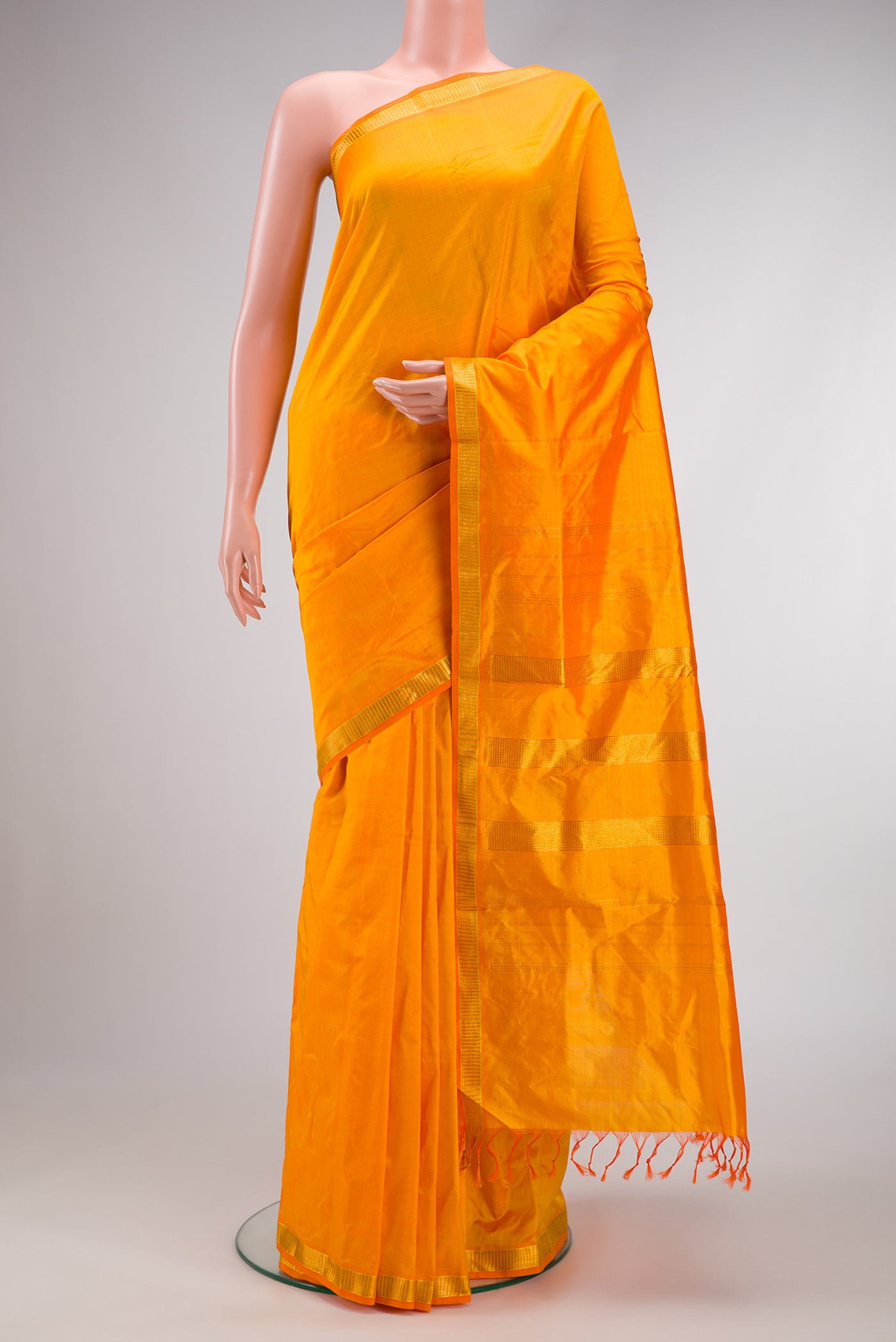 Yellow Dual Tone Kanjivaram Silk Nine Yards Saree with Plain Body and Zari Border.  displayed on a mannequin