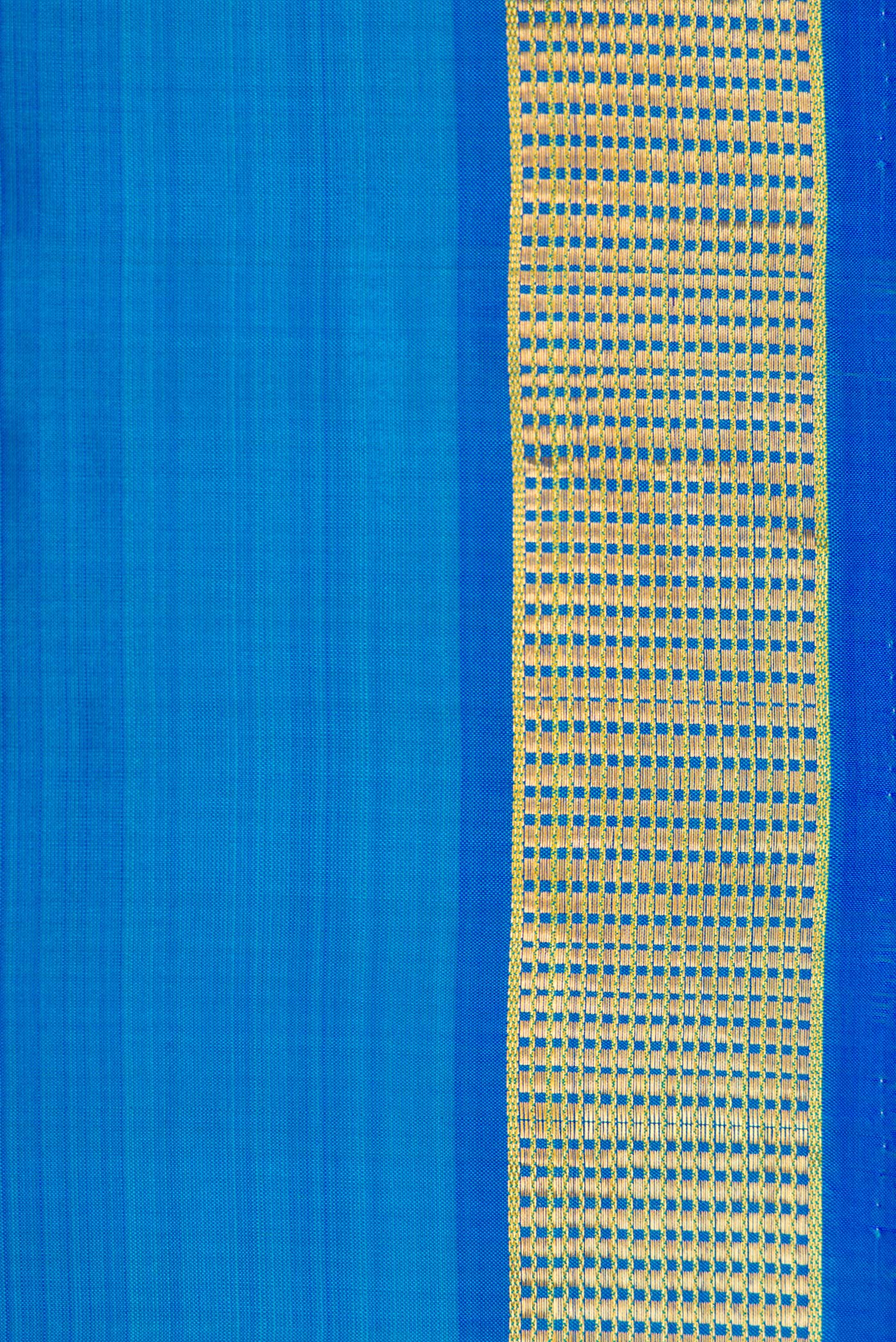 Border image of Peacock Blue Dual Tone Kanjivaram Silk Nine Yards Saree with Plain Body and Zari Border. 