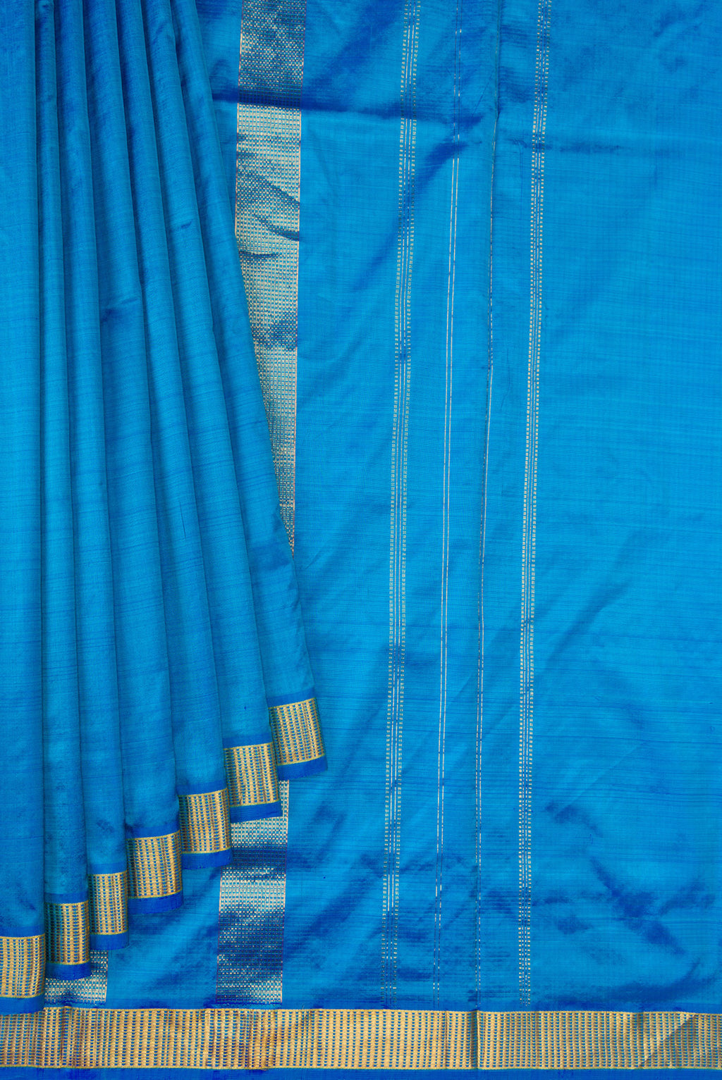 Pleats and pallu of Peacock Blue Dual Tone Kanjivaram Silk Nine Yards Saree with Plain Body and Zari Border. 
