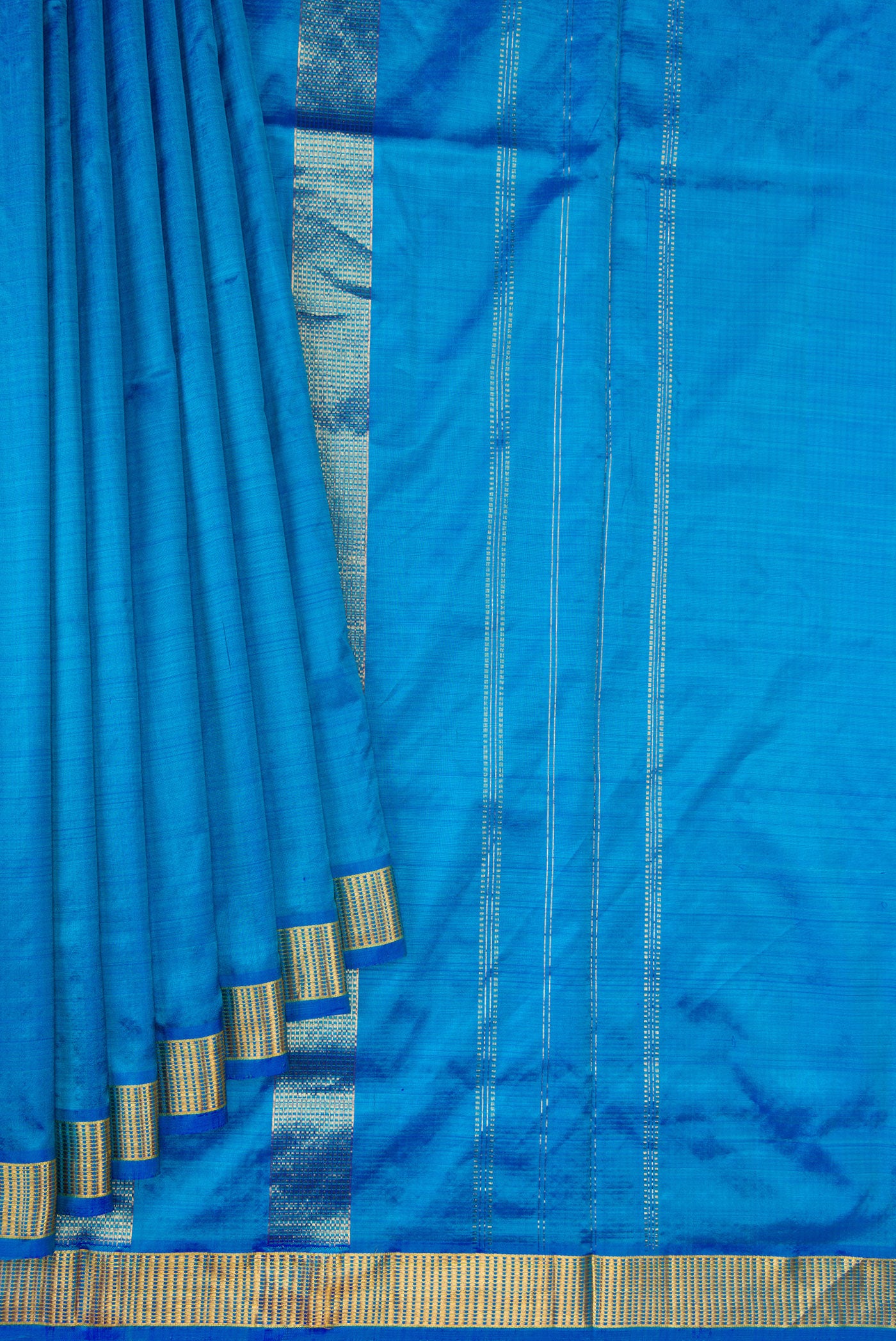 Pleats and pallu of Peacock Blue Dual Tone Kanjivaram Silk Nine Yards Saree with Plain Body and Zari Border. 