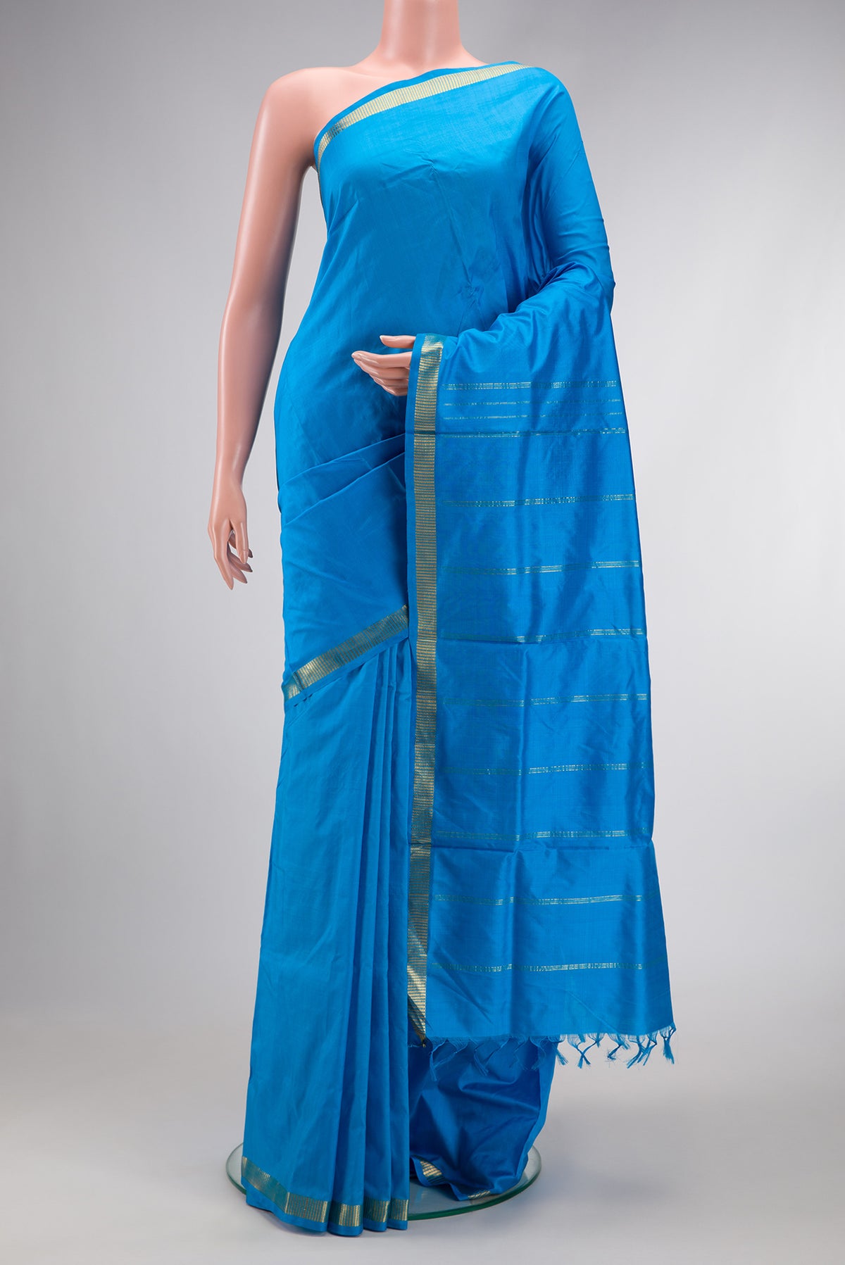 Sky Blue Dual Tone Kanjivaram Silk Nine Yards Saree with Plain Body and Zari Border.  displayed on a mannequin