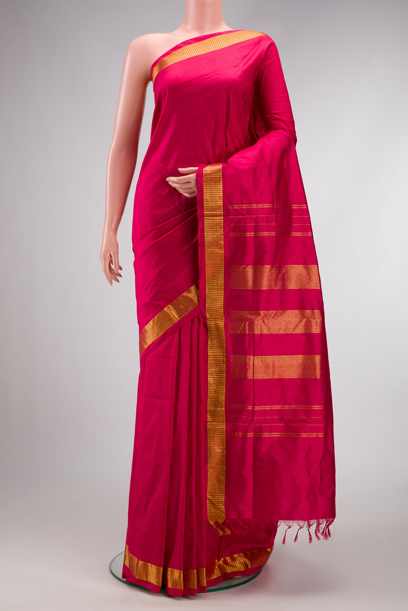 Dark Pink Dual Tone Kanchipuram Silk Nine Yards Saree with Plain Body and Zari Border.  displayed on a mannequin