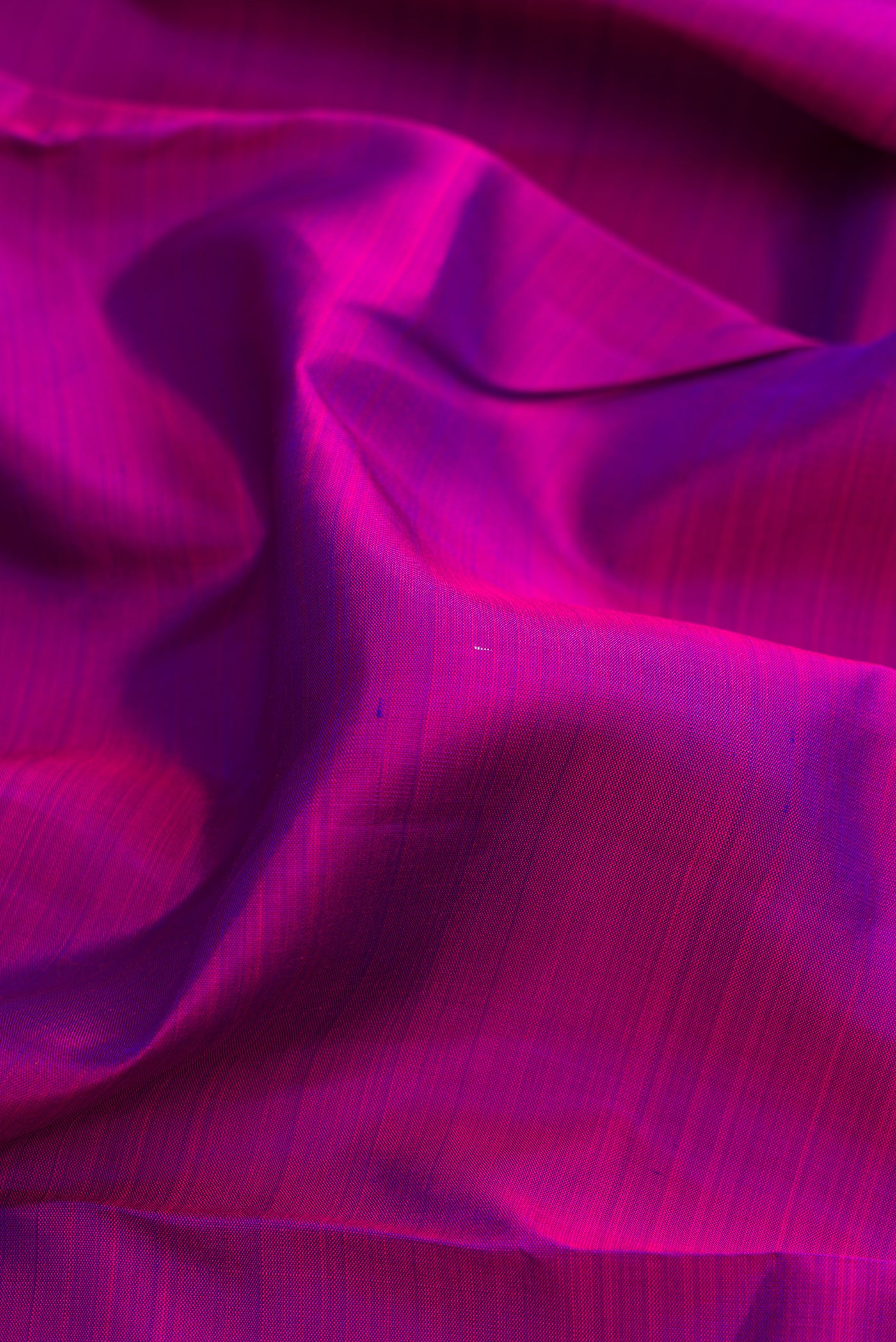 Close up of Pure Silk Pure Zari Purple Kanchipuram Nine Yards Saree with Plain Body and Zari Border.  displaying folds