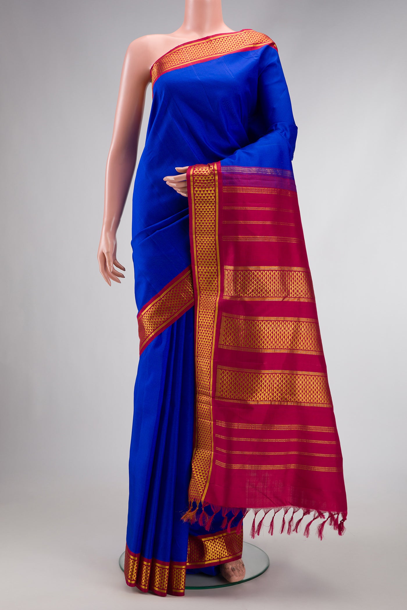 Pure Silk Pure Zari Royal Blue Dual Tone Kanchipuram Nine Yards Saree with Plain Body and Zari Border.  displayed on a mannequin