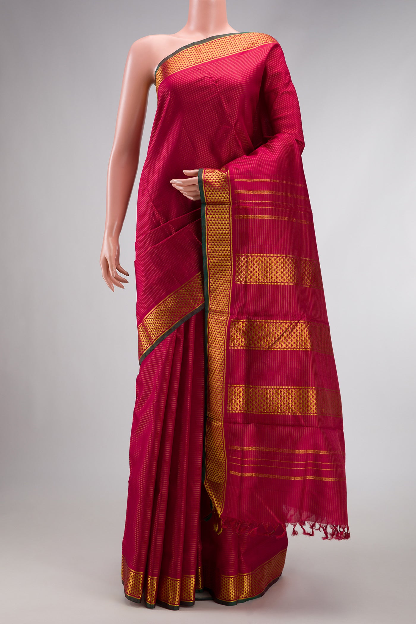 Pure Silk Pure Zari Maroon Dual Tone Kanjivaram Nine Yards Saree with Stripes on the body and Zari Border.  displayed on a mannequin