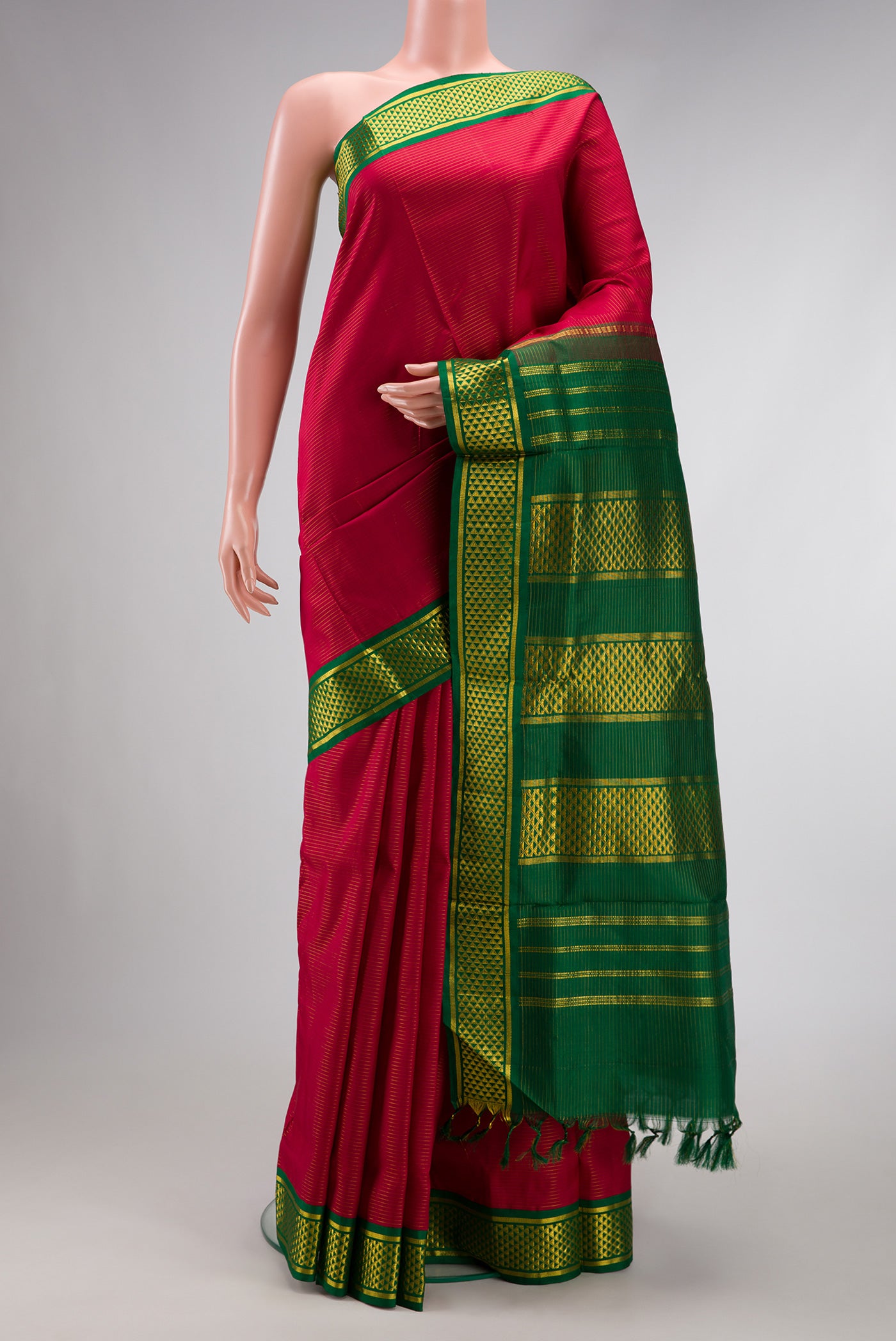 Pure Silk Pure Zari Maroon Dual Tone Kanchipuram Nine Yards Saree with Plain Body and Zari Border.  displayed on a mannequin