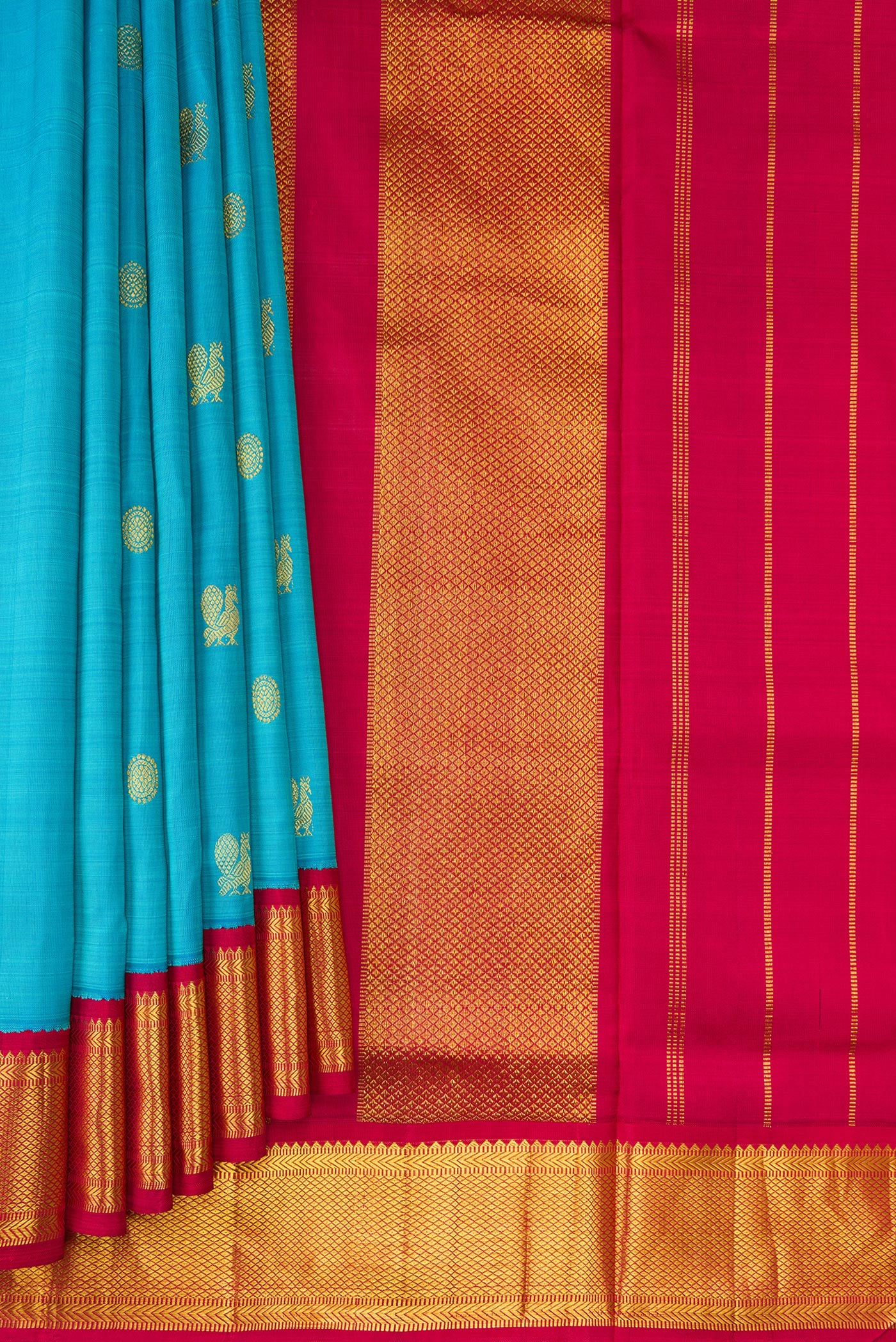 Pleats and pallu of Pure Silk Pure Zari Sky Blue Dual Tone Kanchipuram Nine Yards Saree with Zari Butta on the body and Zari Border. 