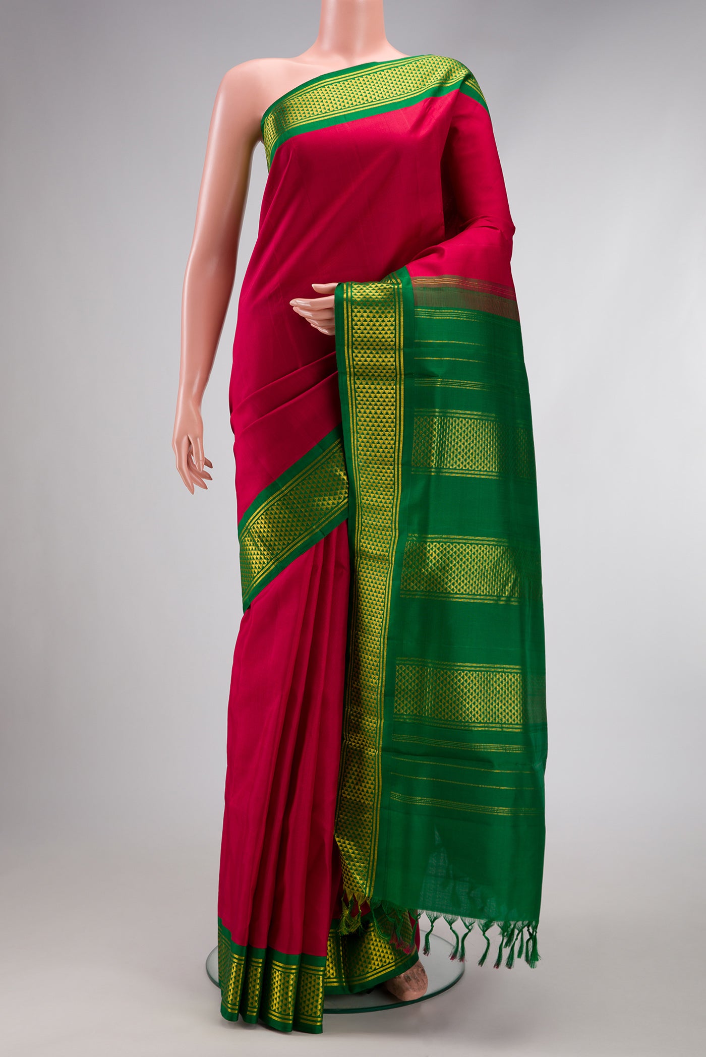 Pure Silk Pure Zari Maroon Kanchipuram Nine Yards Saree with Plain Body and Zari Border.  displayed on a mannequin