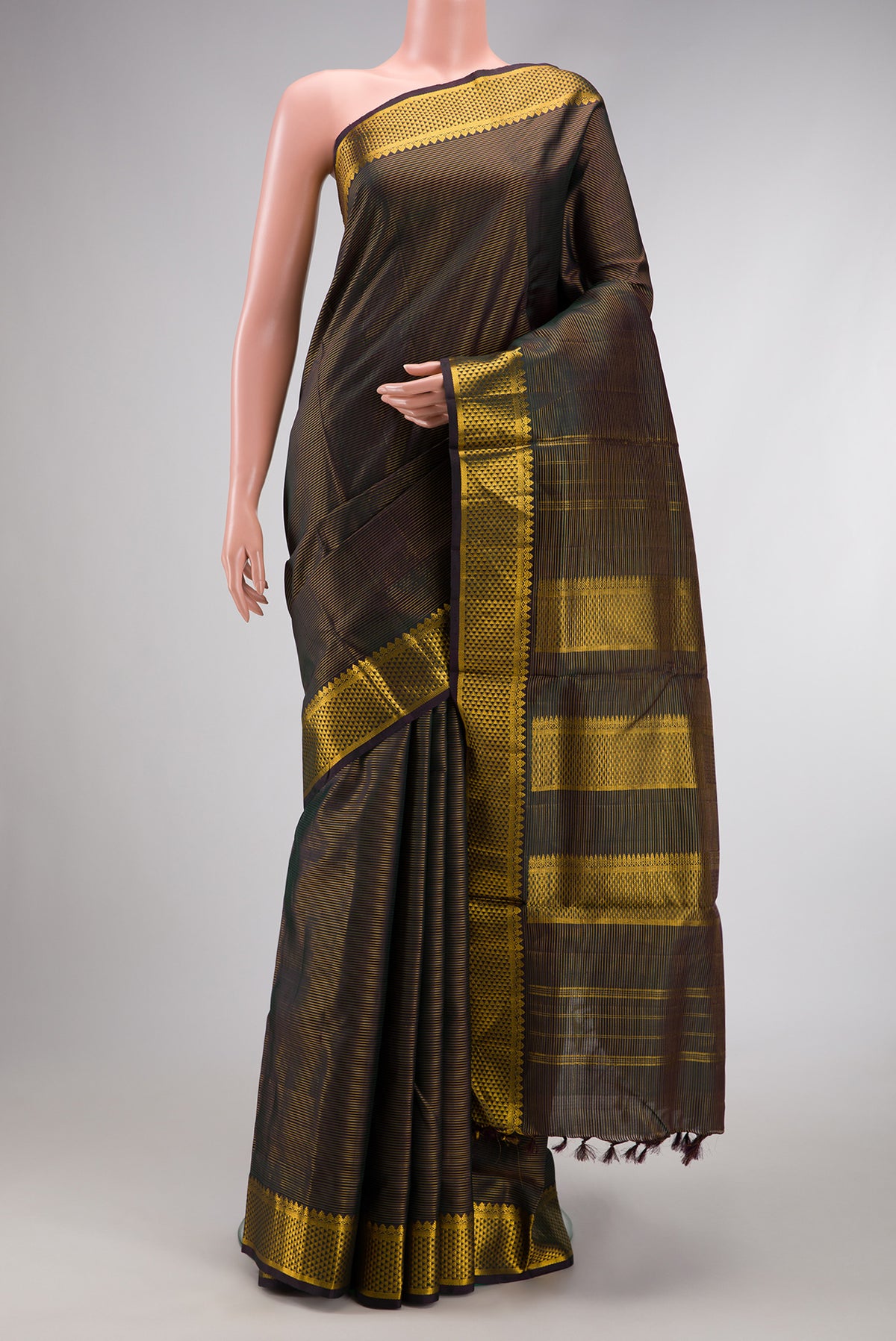 Black Dual Tone Kanjivaram Silk Nine Yards Saree with Stripes on the body and Zari Border.  displayed on a mannequin