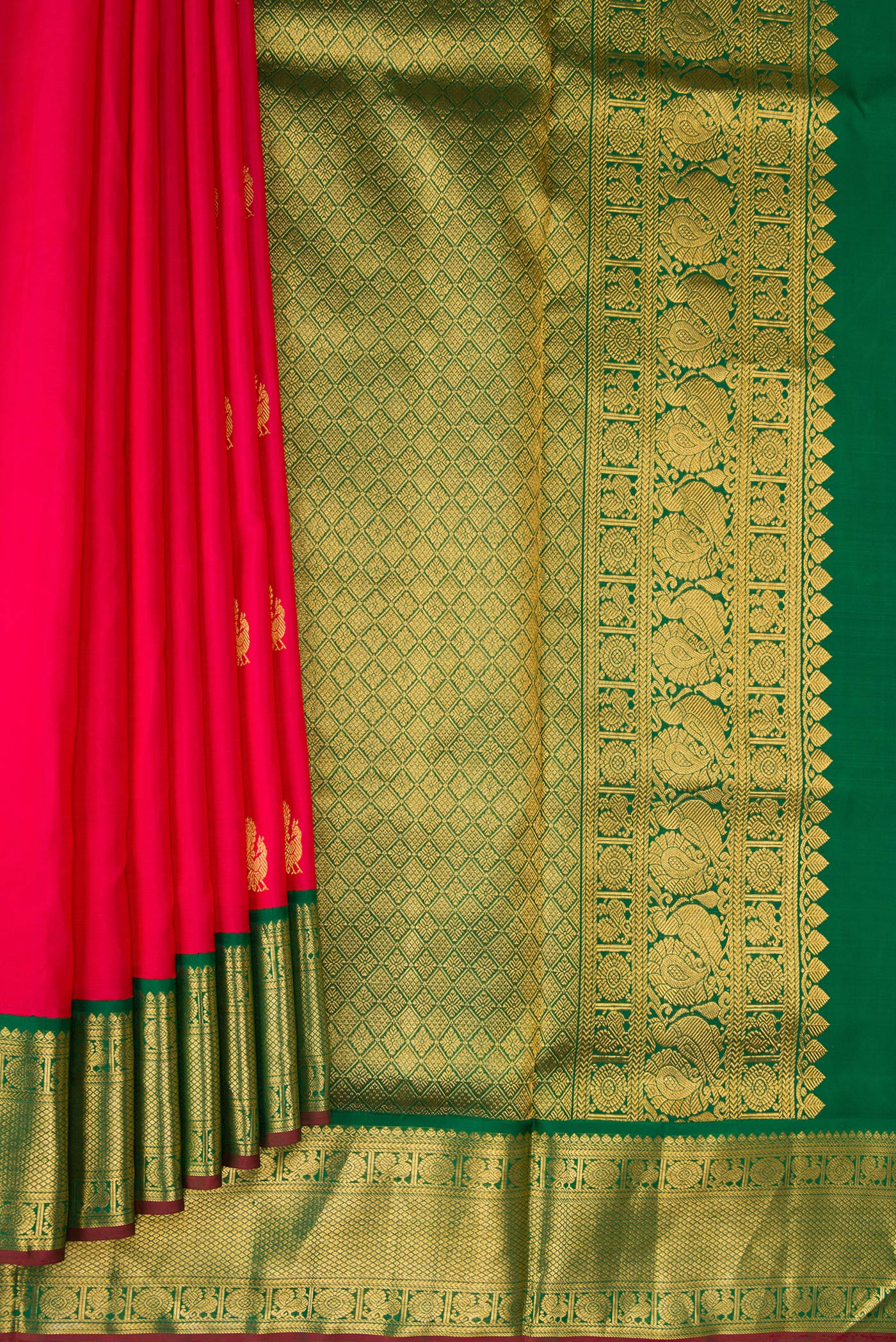 Pleats and pallu of Pure Silk Pure Zari Dark Pink Dual Tone Kanchipuram Nine Yards Saree with Zari Butta on the body and Zari Border. 