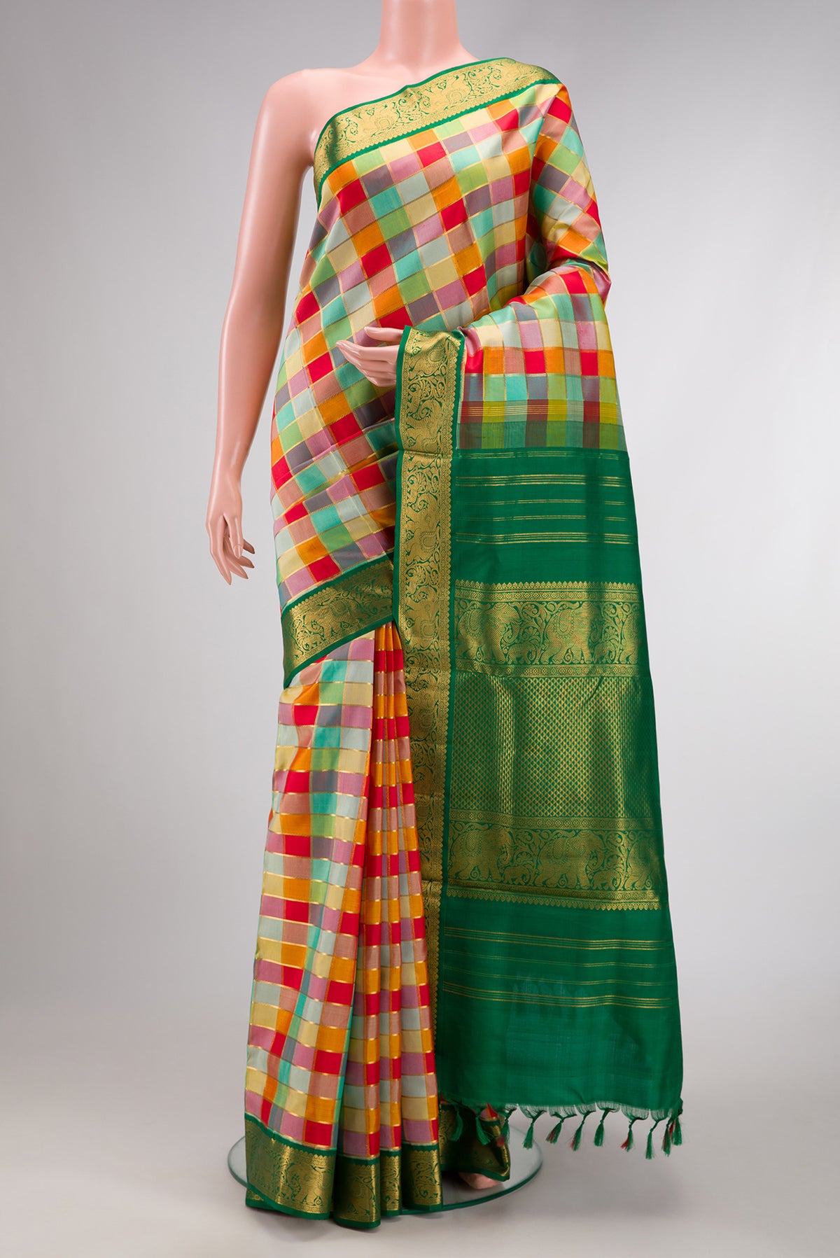 Red, Mustard, Green & pink Color Kanchipuram Silk Nine Yards Saree with Checked design on the body and Zari Border.  displayed on a mannequin