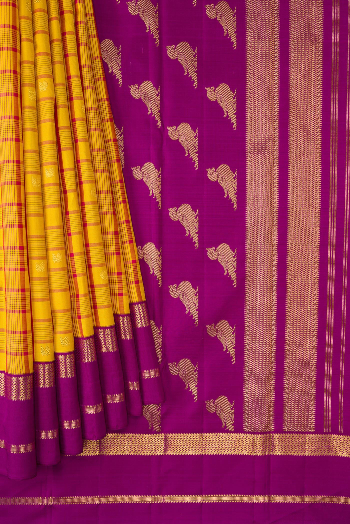 Pleats and pallu of Pure Silk Pure Zari Mustard Dual Tone Kanjivaram Saree with Checked design on the body and Zari Border. 