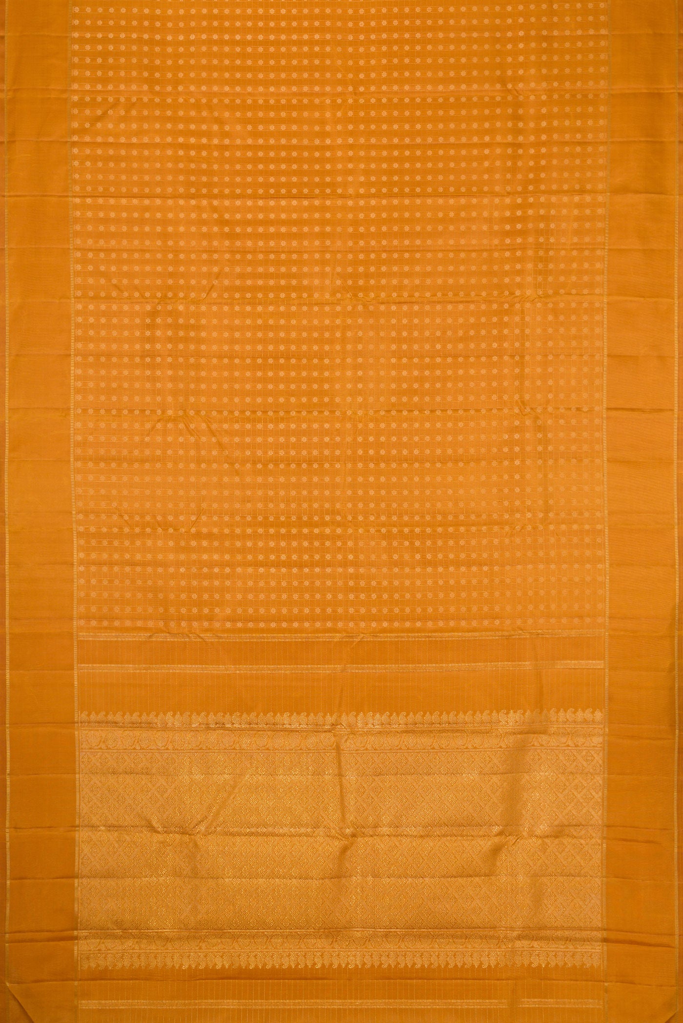Flat view of Mustard Dual Tone Kanchipuram Silk Saree with Zari Butta on the body and Zari Border. 