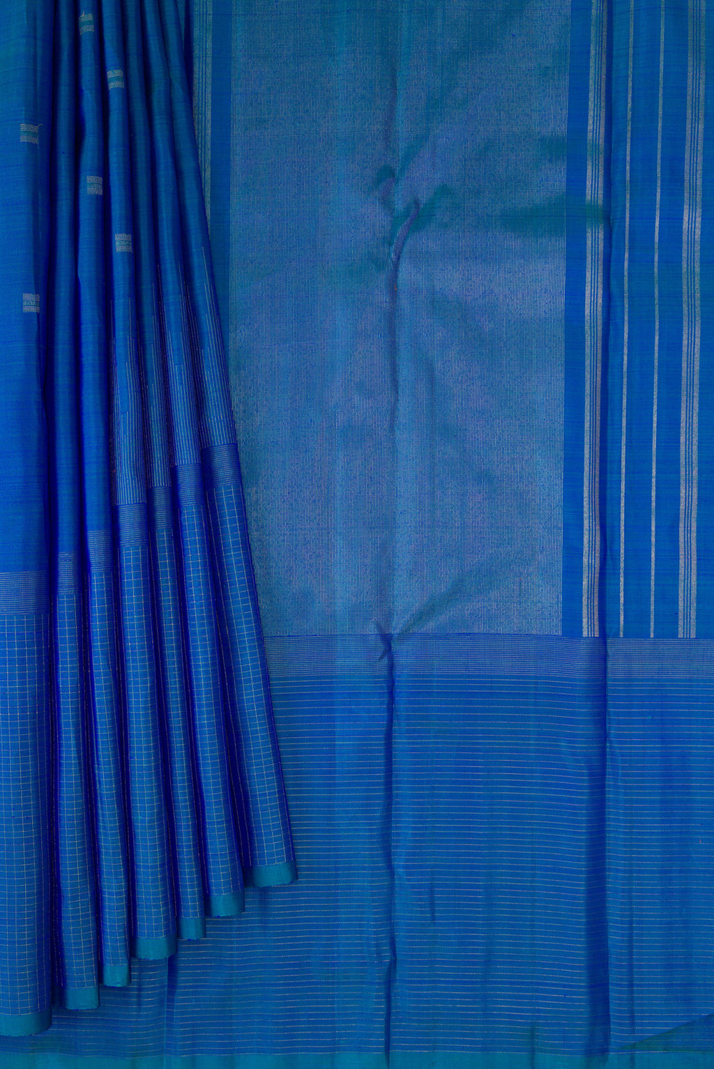 Pleats and pallu of Pure Silk Pure Zari Peacock Blue Dual Tone Kanchipuram Saree with Zari Butta on the body and Zari Border. 