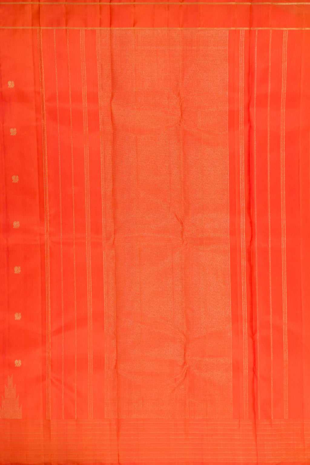 Close up image of the pallu of Pure Silk Pure Zari Orange Kanchipuram Saree with Zari Butta on the body and Fancy Border. 