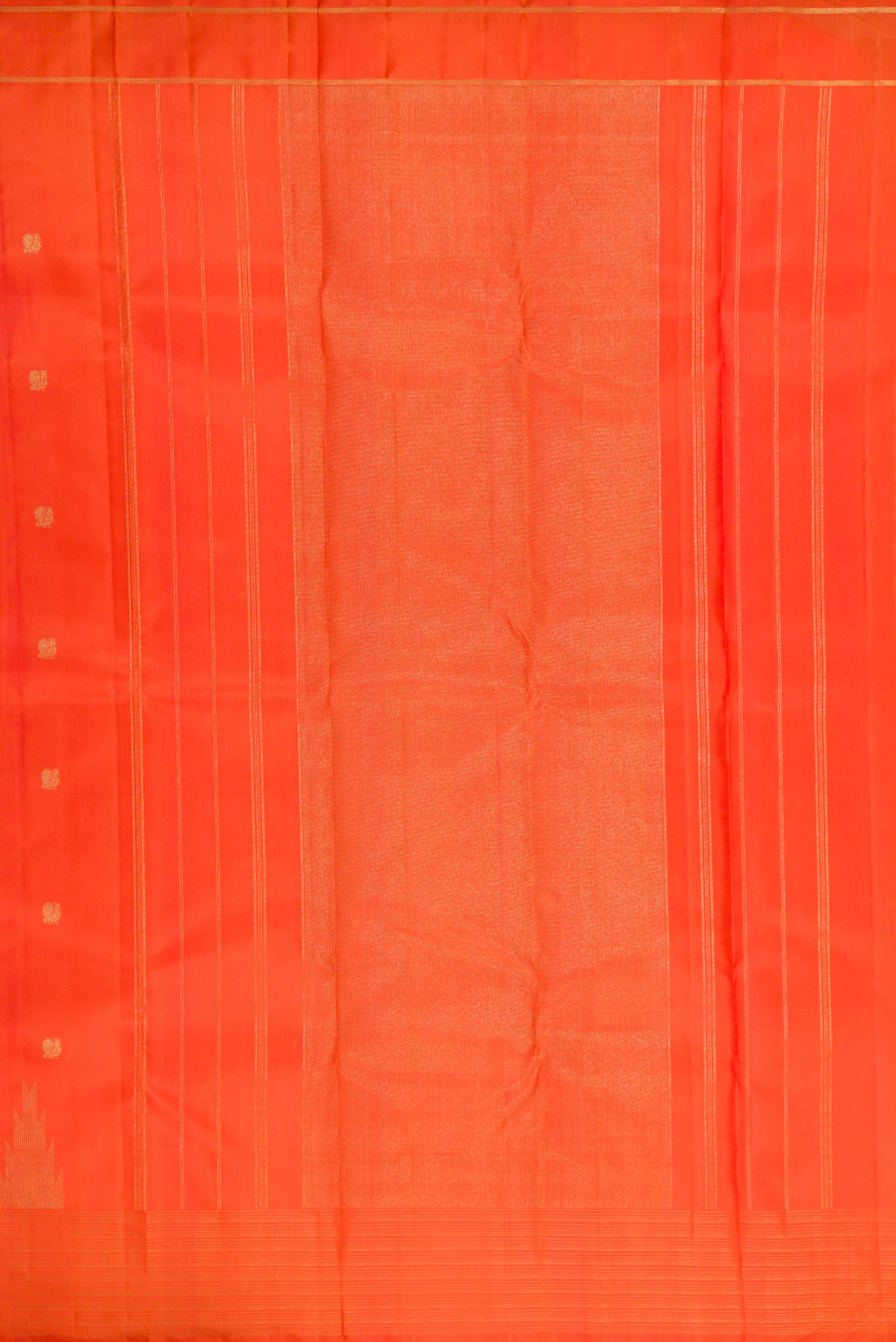 Close up image of the pallu of Pure Silk Pure Zari Orange Kanchipuram Saree with Zari Butta on the body and Fancy Border. 