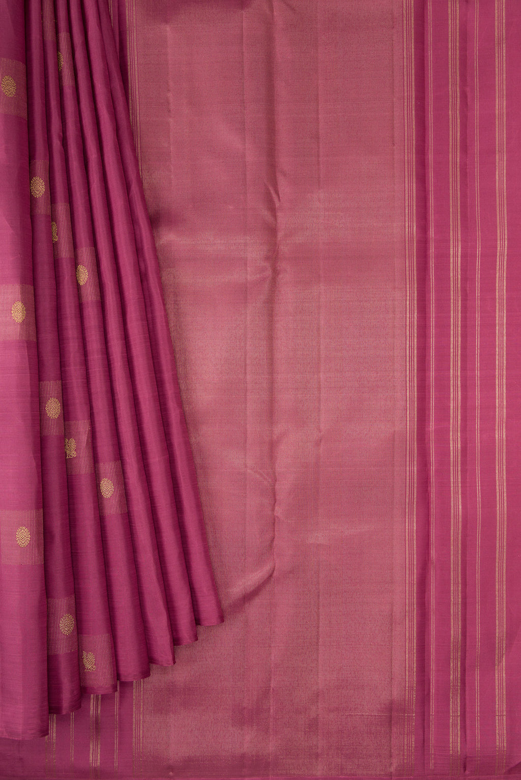 Pleats and pallu of Pure Silk Pure Zari Rose Gold Dual Tone Kanjivaram Saree with Zari Butta on the body and Without Border. 
