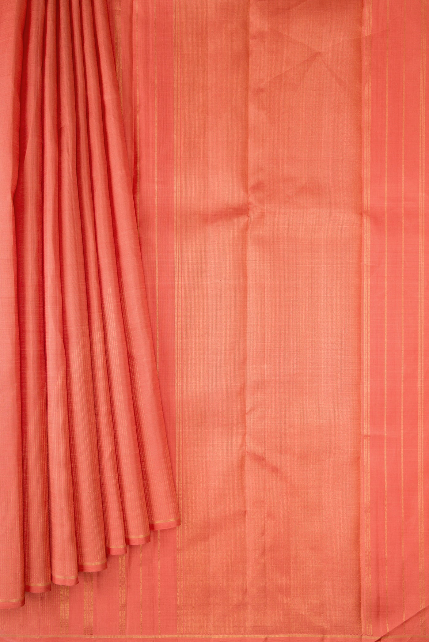 Pleats and pallu of Pure Silk Pure Zari Golden Peach Dual Tone Kanjivaram Saree with Stripes on the body and Fancy Border. 