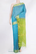 Sky Blue Silk Cotton Saree with Zari Butta on the body and Zari Border.  displayed on a mannequin