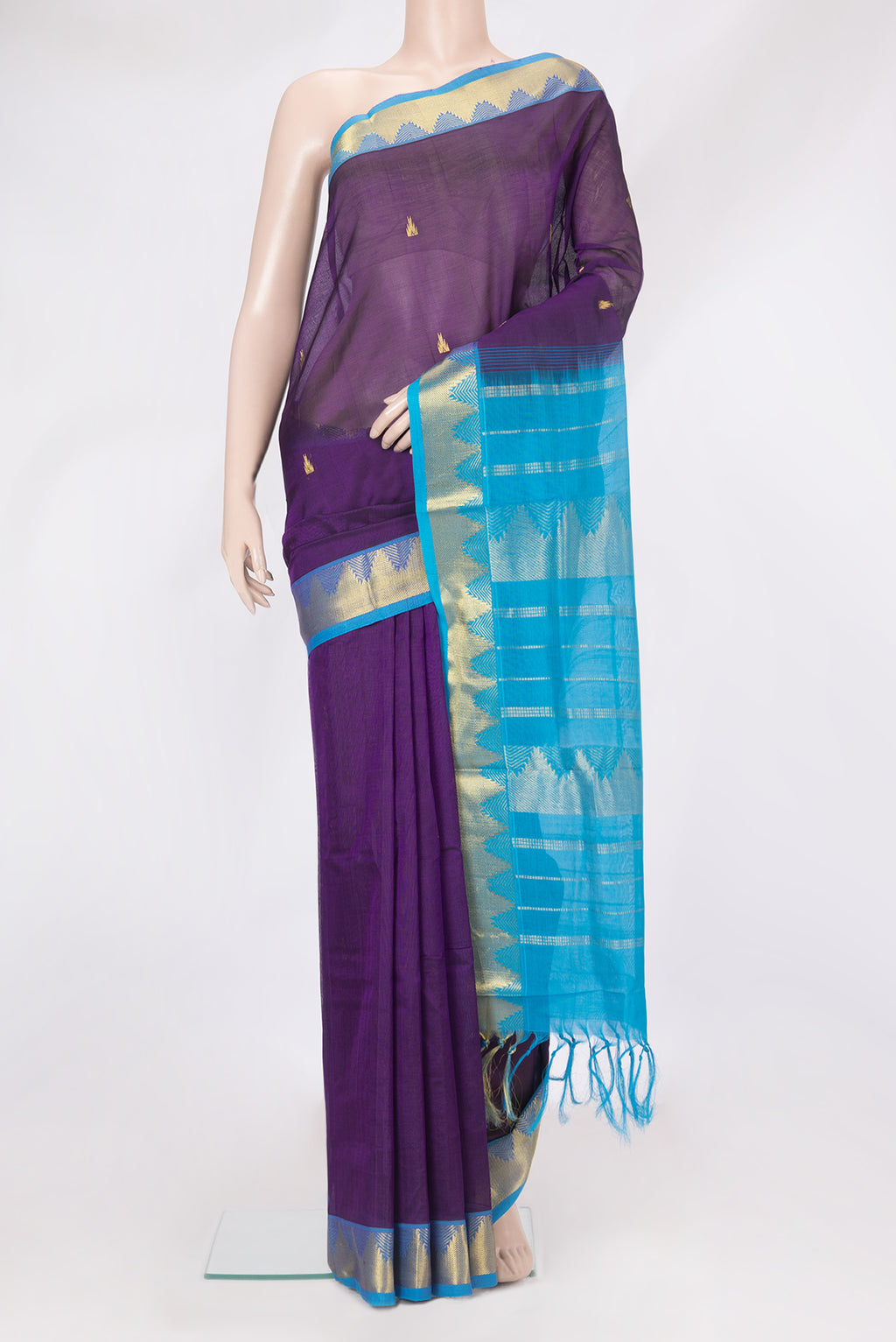 Violet Silk Cotton Saree with Zari Butta on the body and Zari Border.  displayed on a mannequin