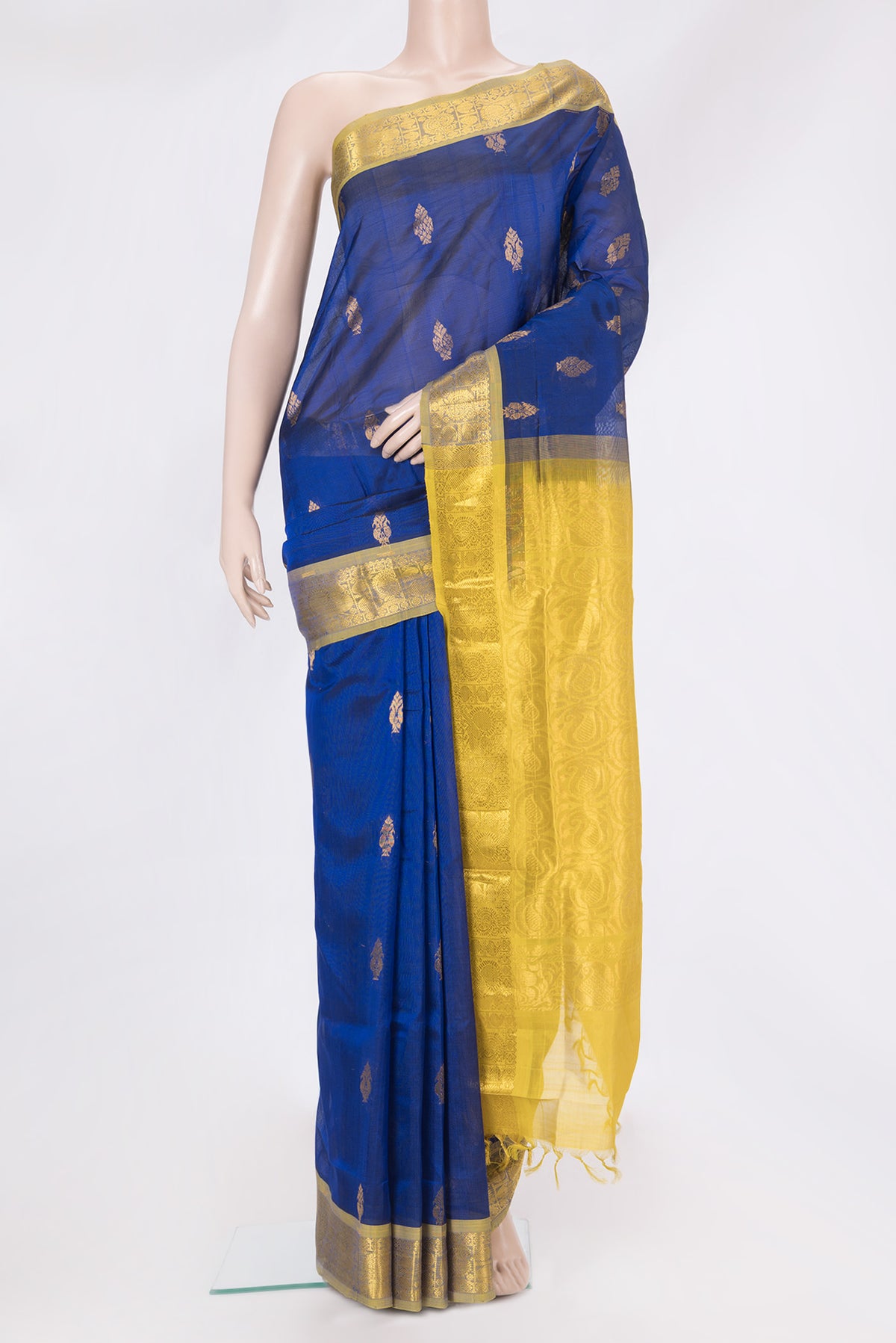 Royal Blue Silk Cotton Saree with Zari Butta on the body and Zari Border.  displayed on a mannequin