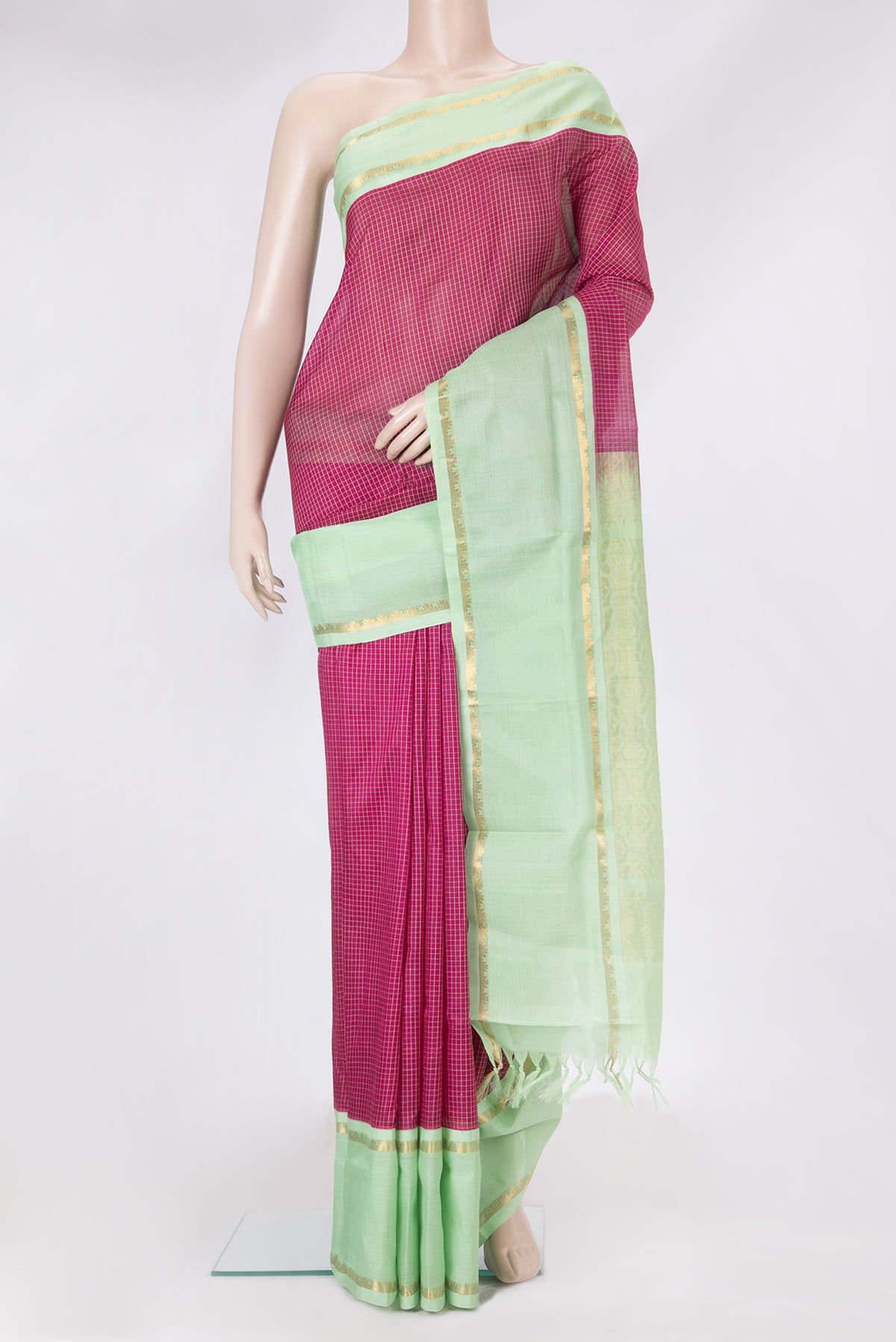 Pink Silk Cotton Saree with Checked design on the body and Plain Border.  displayed on a mannequin