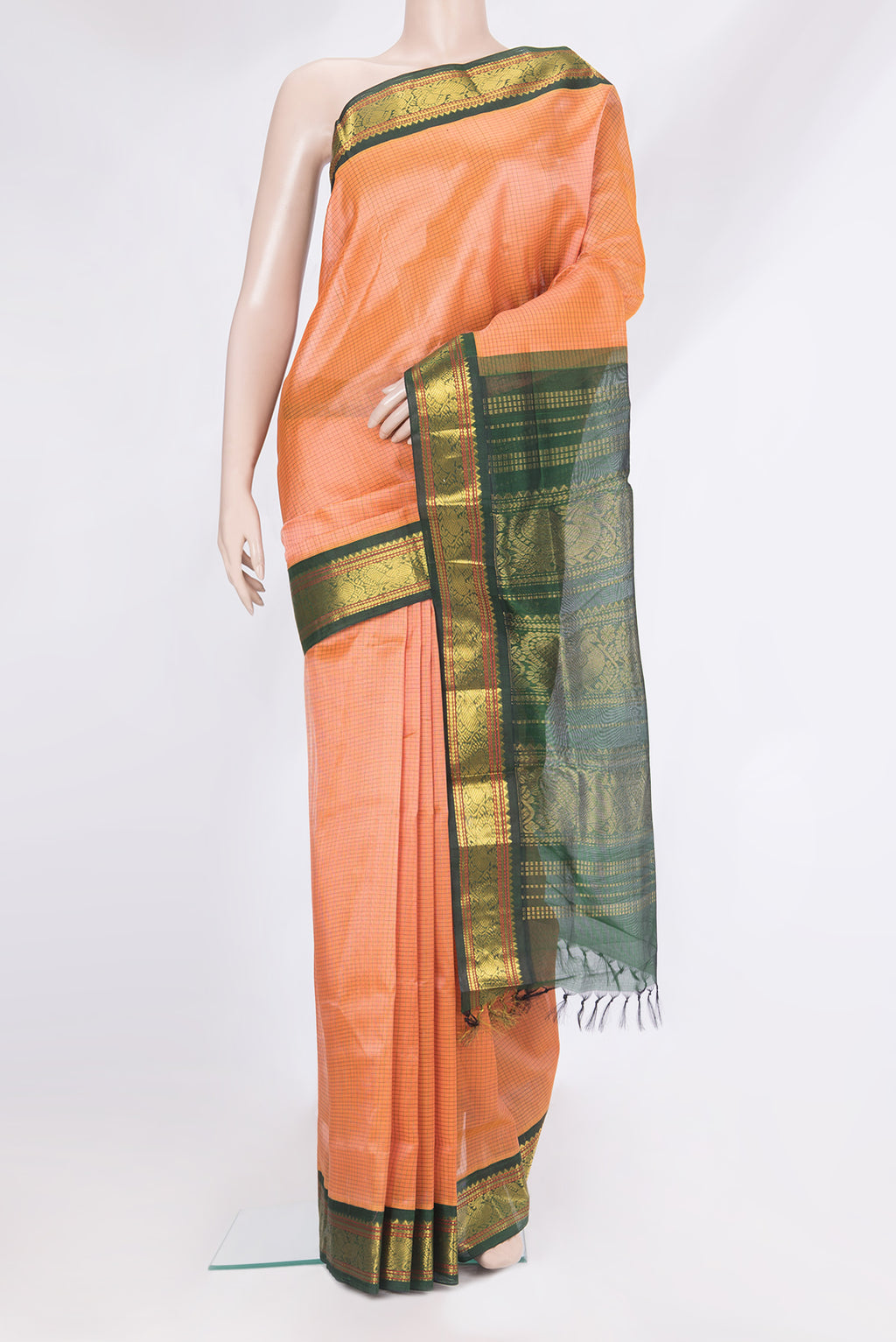 Orange Silk Cotton Saree with Checked design on the body and Zari Border.  displayed on a mannequin
