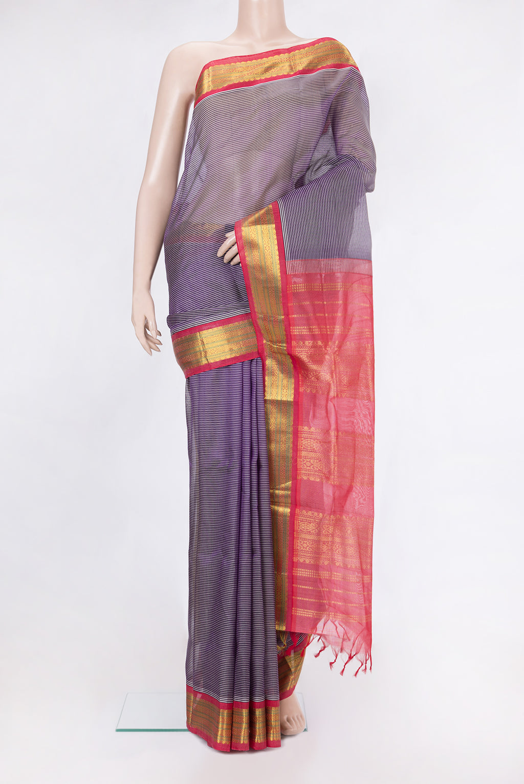 Purple Dual Tone Silk Cotton Saree with Stripes on the body and Zari Border.  displayed on a mannequin