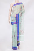 Light Green Kota Silk Saree with Printed design on the body and Thread Border.  displayed on a mannequin