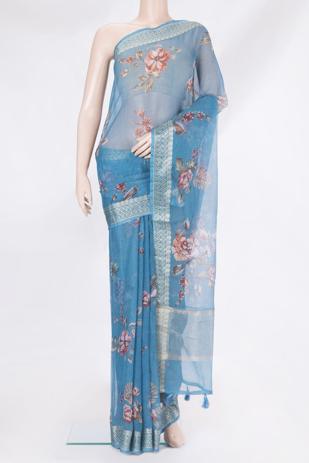 Blue Kota Silk Saree with Printed design on the body and Thread Border.  displayed on a mannequin