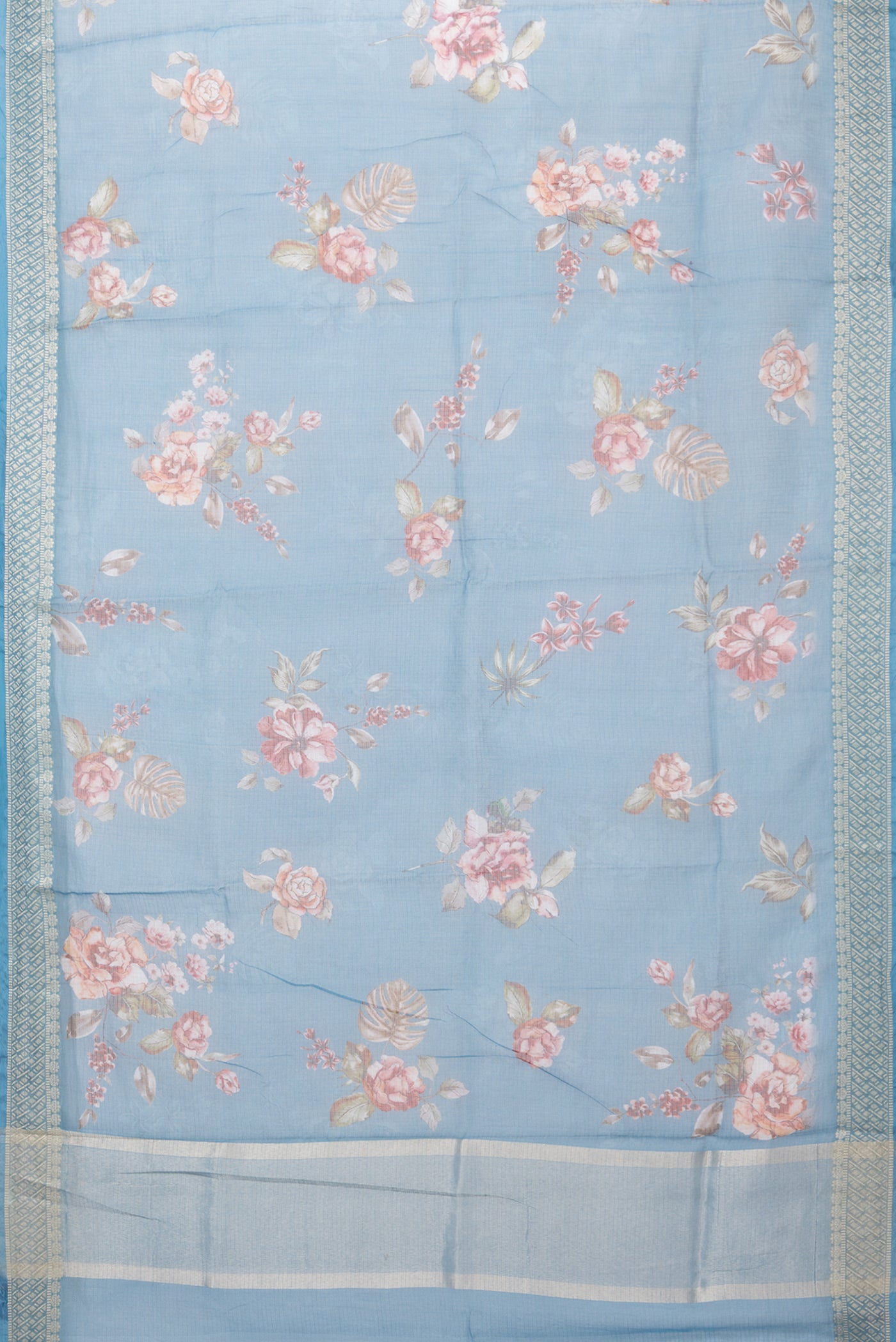 Flat view of Blue Kota Silk Saree with Printed design on the body and Thread Border. 