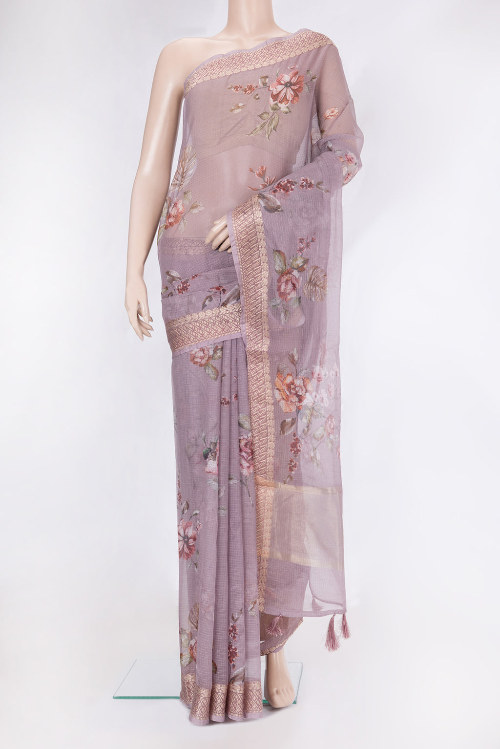 Lavender Kota Silk Saree with Printed design on the body and Zari Border.  displayed on a mannequin