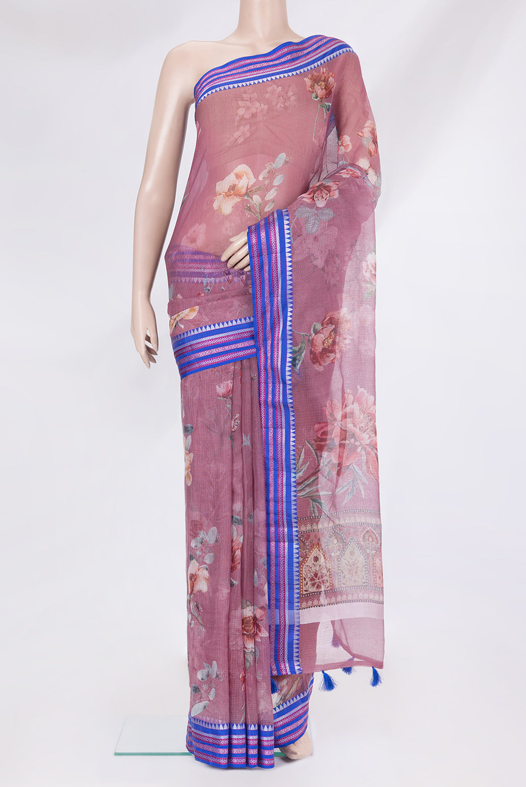 Mauve Kota Silk Saree with Floral Print on the body and Thread Border.  displayed on a mannequin