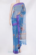Blue Kota Silk Saree with Floral Print on the body and Thread Border.  displayed on a mannequin